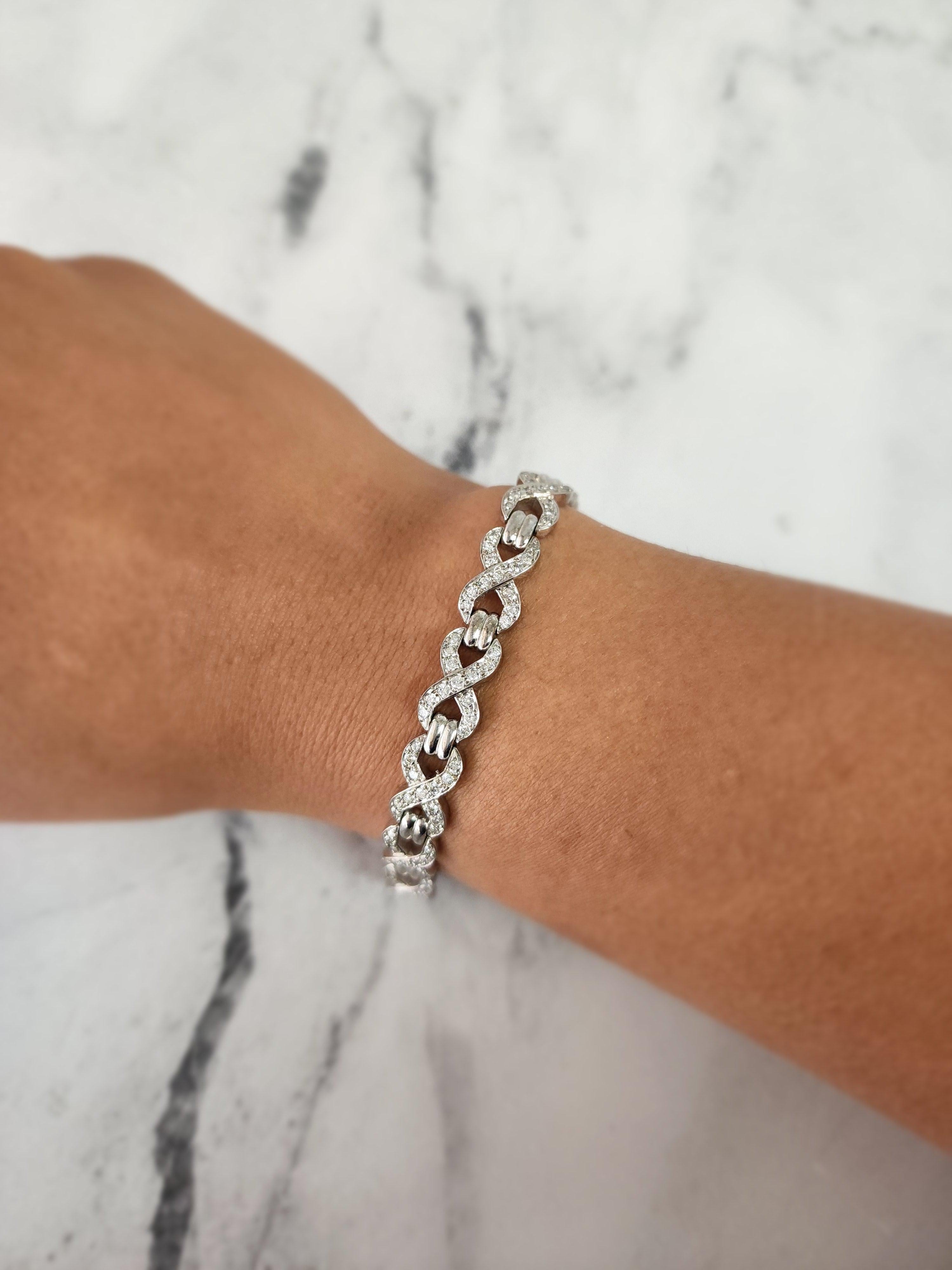 ♥ Descripción de la pulsera de tenis ♥

Piedra principal: Diamante
Aprox. Peso en quilates del diamante: 3,00 ctw
Corte del diamante: Redondo
Tipo de Metal: oro Blanco 14K
Longitud de la pulsera: 7 Pulgadas
Peso: 19 gramos 
Ancho de la pulsera: 8