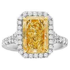 3 Carat Light Yellow Elongated Radiant Cut Halo Diamond Ring