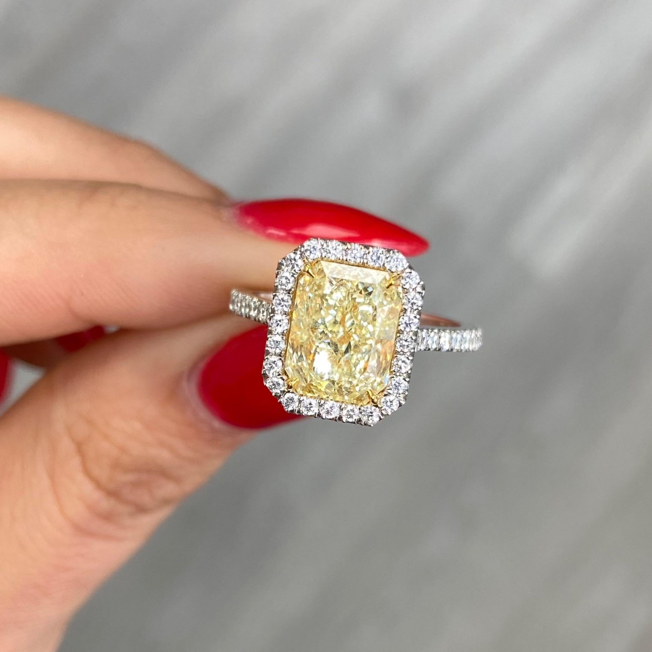 3 Carat Light Yellow Radiant Cut Diamond Halo Engagement Ring In New Condition For Sale In New York, NY