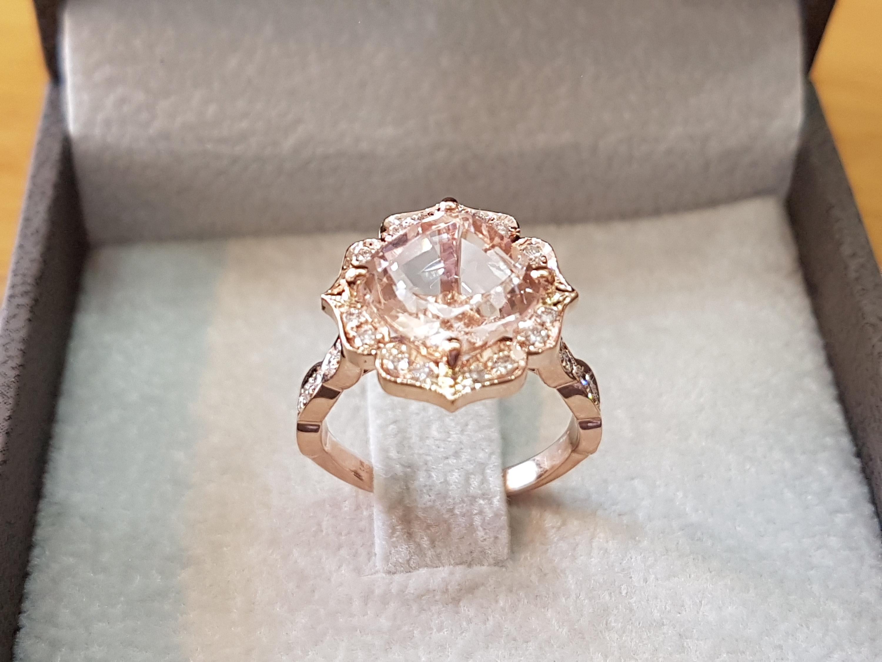 An amazing 9mm pink/peach natural cushion morganite gemstone, adorned by 1/4ctw of white natural diamonds - this ring is a great diamond alternative ring that will draw attention wherever you go.
 Can be a great engagement ring, anniversary or