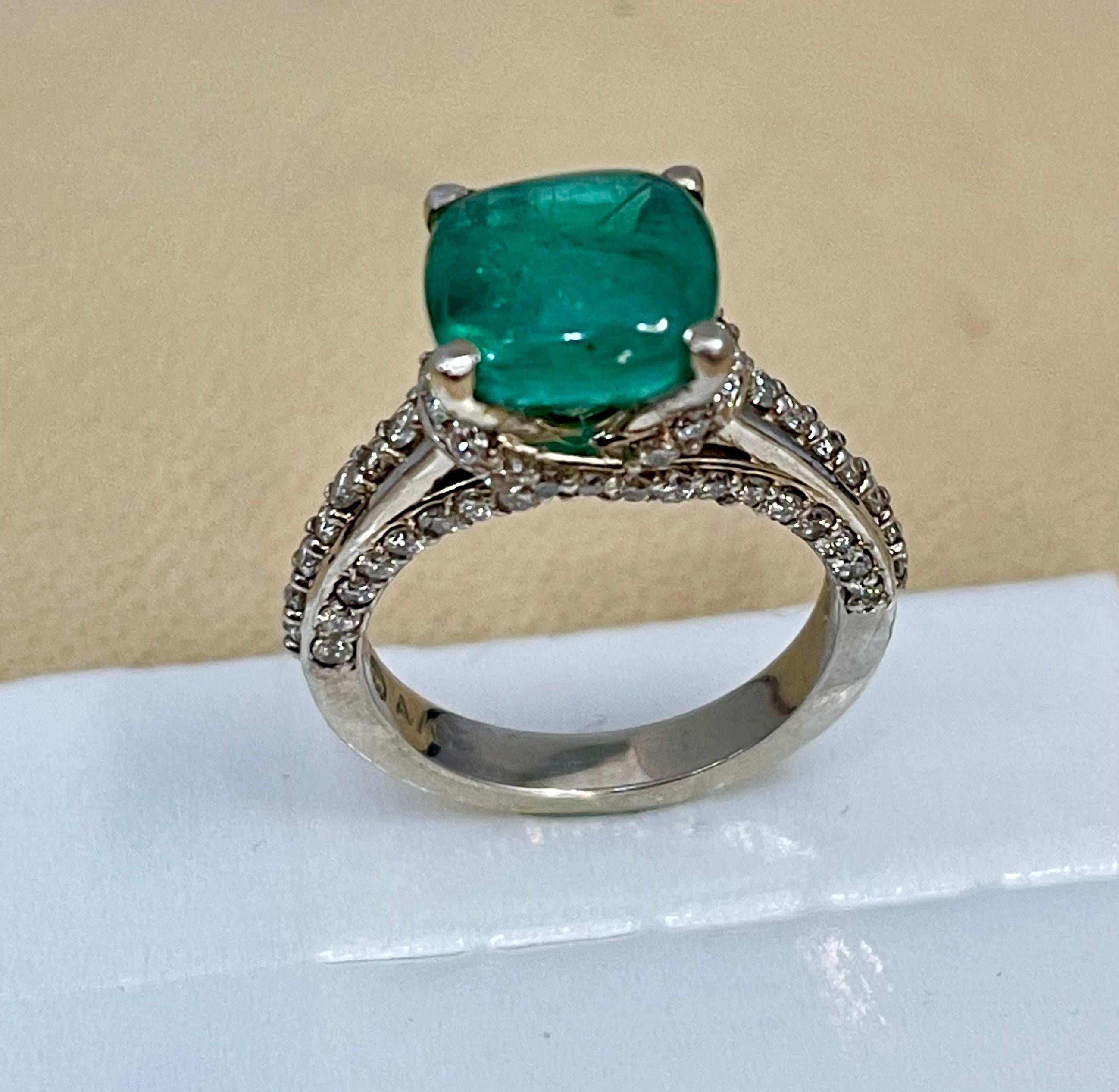 A classic, Cocktail ring 
i am selling this ring at a very reasonable price.
Approximately  3 Carat Natural Cushion Cabochon Emerald & Diamond Ring 14 Karat White Gold size 6.5
Intense green color, Beautiful stone with shine and luster  but has