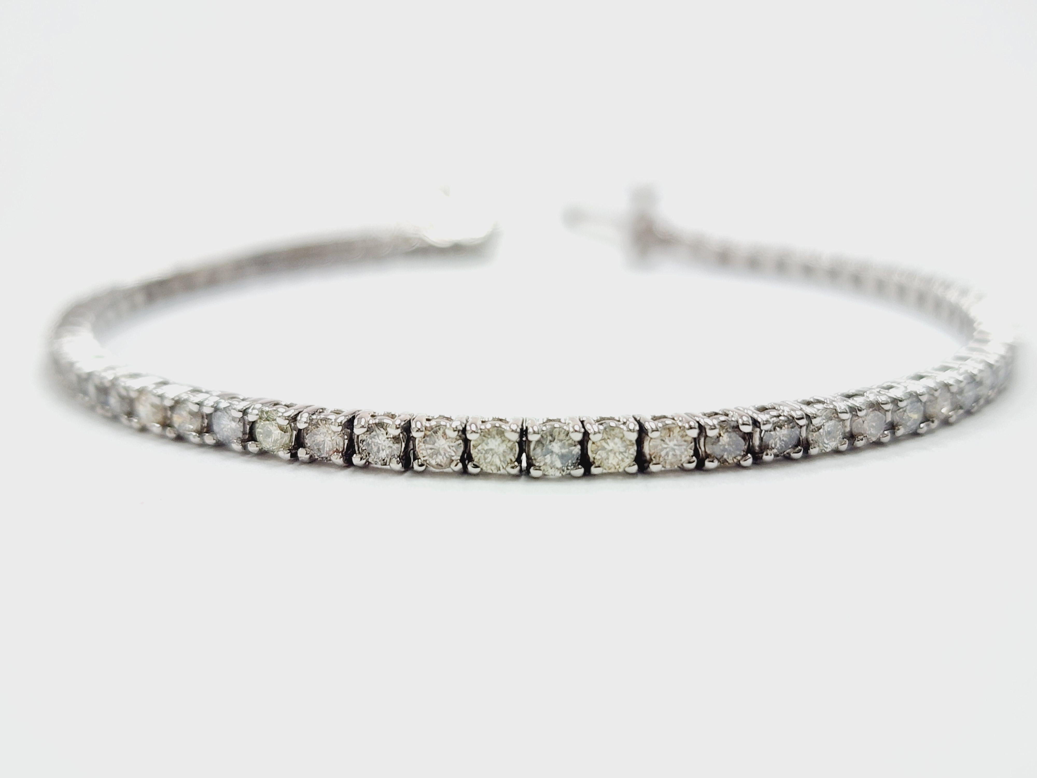 3 Carat Natural Diamond Tennis Bracelet in 14K Heavy Solid White Gold.
Well crafted with excellent shine and high quality all natural diamonds.

Color Range: K
Clarity Range: I 
Width: 2.6 mm

*Free shipping within the U.S.*