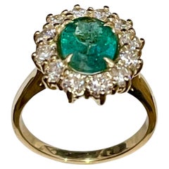3 Carat Natural Oval Emerald and Diamond Ring 14 Karat Yellow Gold