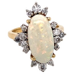 3 Carat Opal and Diamond Ring in 18 Karat Yellow Gold