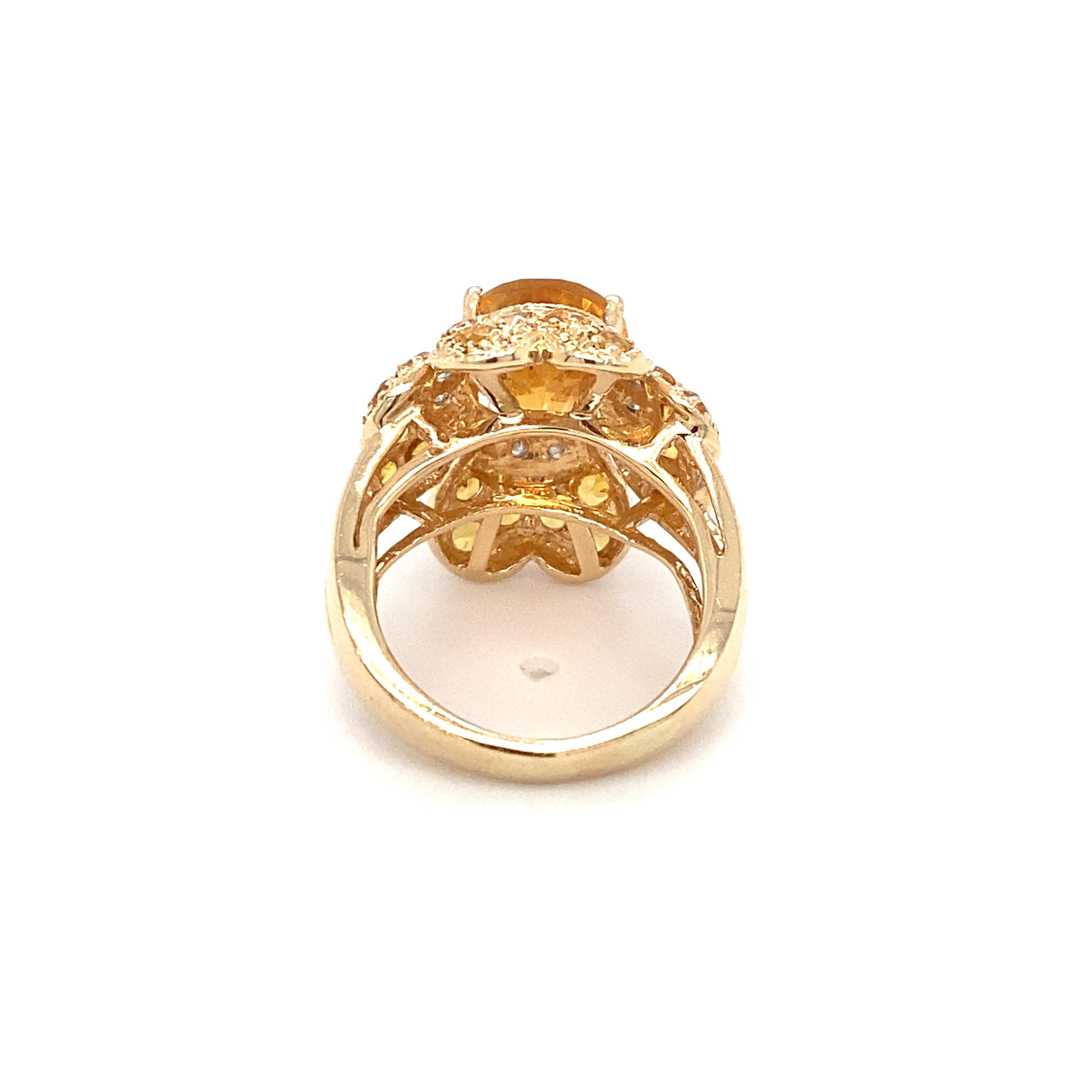 Item Details: This flower design ring has a beautiful center citrine with diamond and citrine accents.

Circa: 1990s
Metal Type: 14 Karat Yellow Gold 
Weight: 5.8 grams
Size: US 5, resizable

Diamond Details:

Carat: 0.15 carat total weight
Shape: