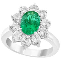 3 Carat Oval Cut Colombian Emerald and Diamond 18 Karat Gold Ring Estate