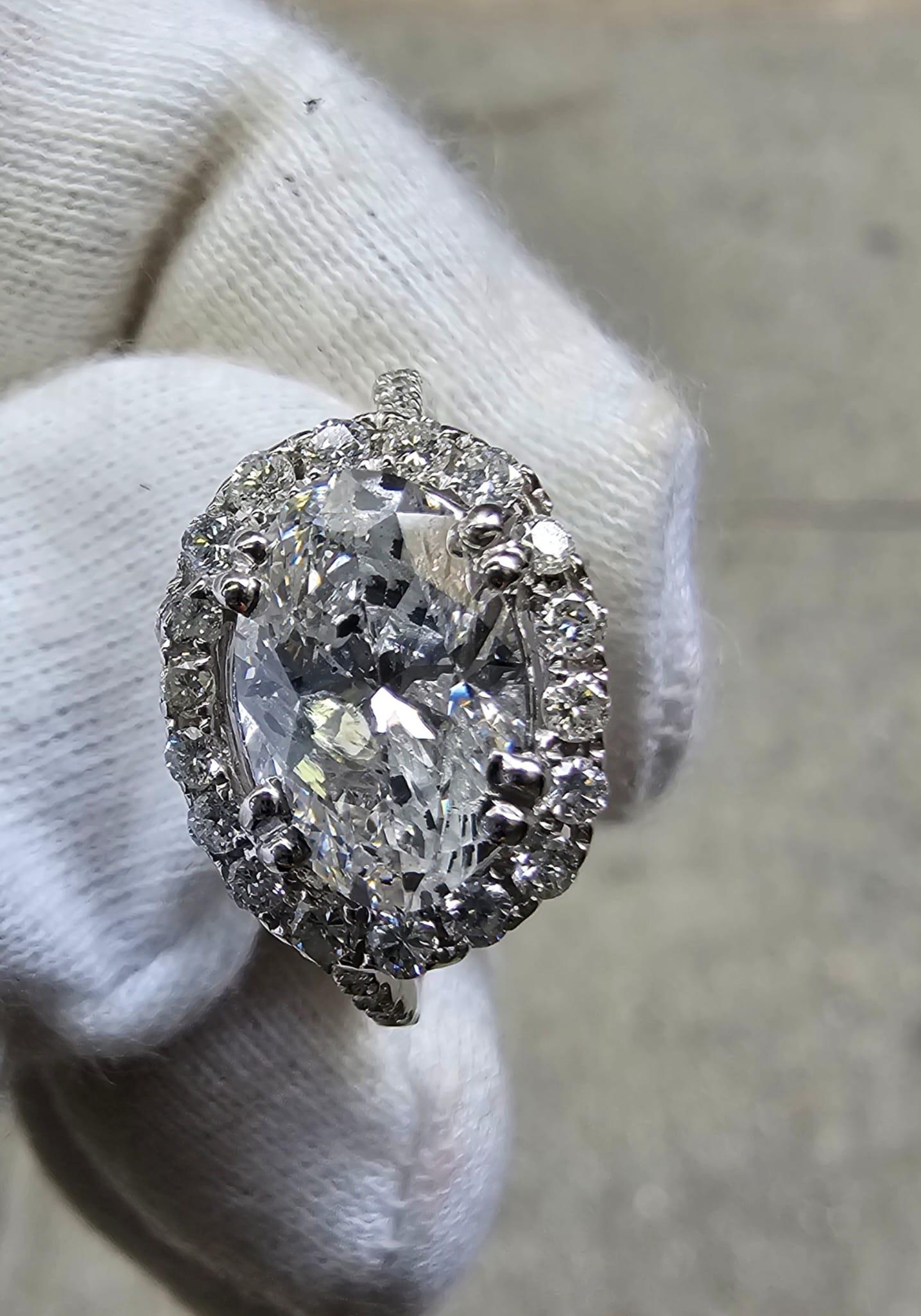 2 Carat Oval Cut Diamond Engagement Ring Colorless F East West Halo Bypass Micr  In New Condition For Sale In New York, NY