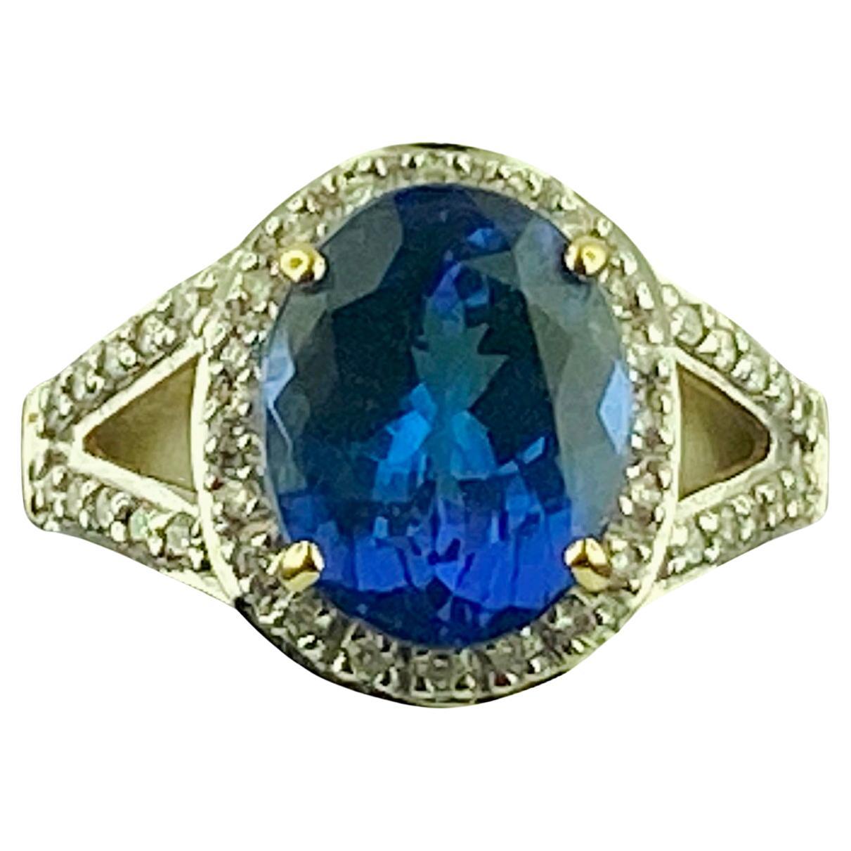 3 Carat Oval Cut Tanzanite & Diamond Ring For Sale