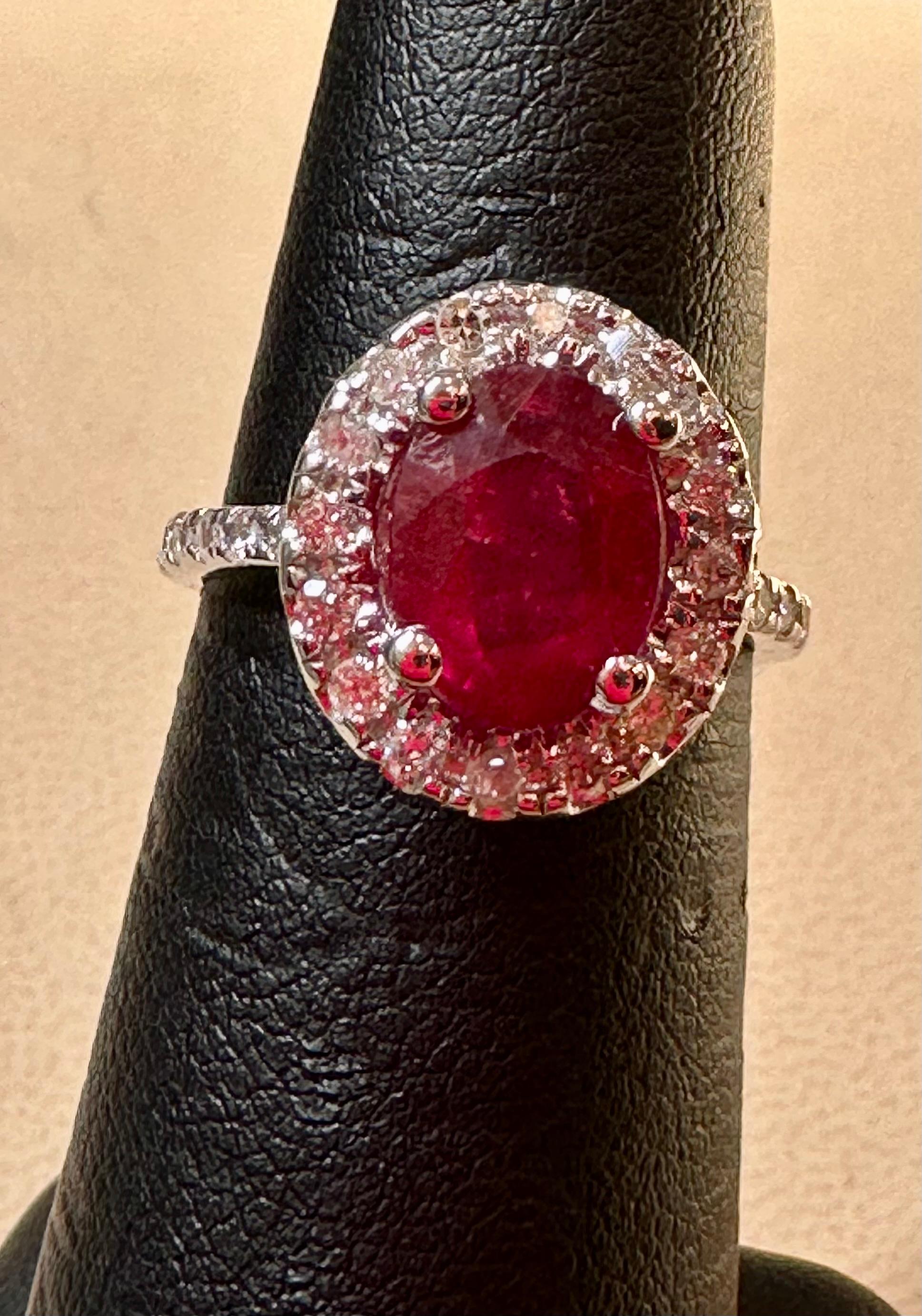 Oval Cut 3 Carat Oval Treated Ruby & 1.25 ct Diamond Ring 14 Karat White Gold Size 6 For Sale
