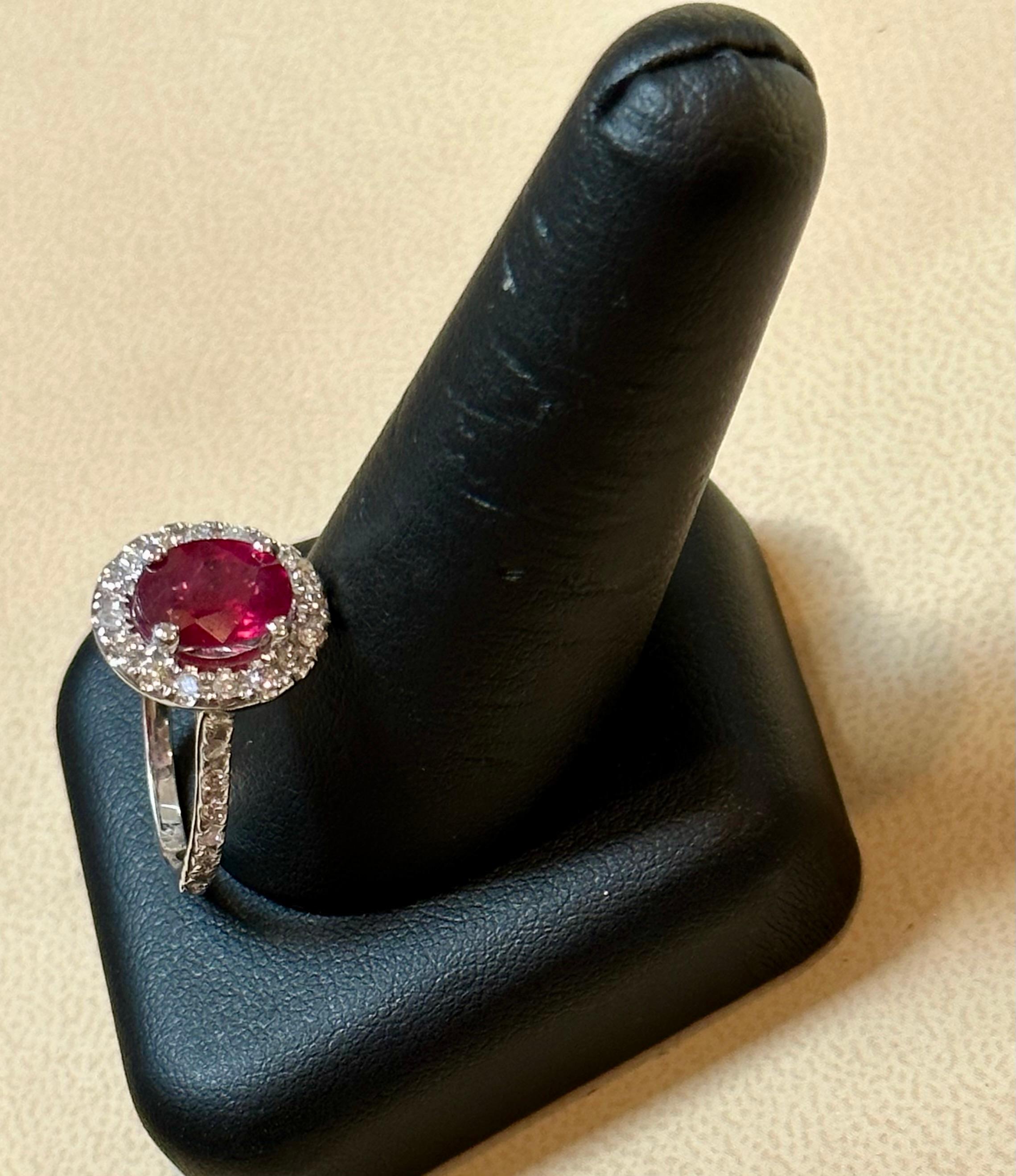 Women's 3 Carat Oval Treated Ruby & 1.25 ct Diamond Ring 14 Karat White Gold Size 6 For Sale