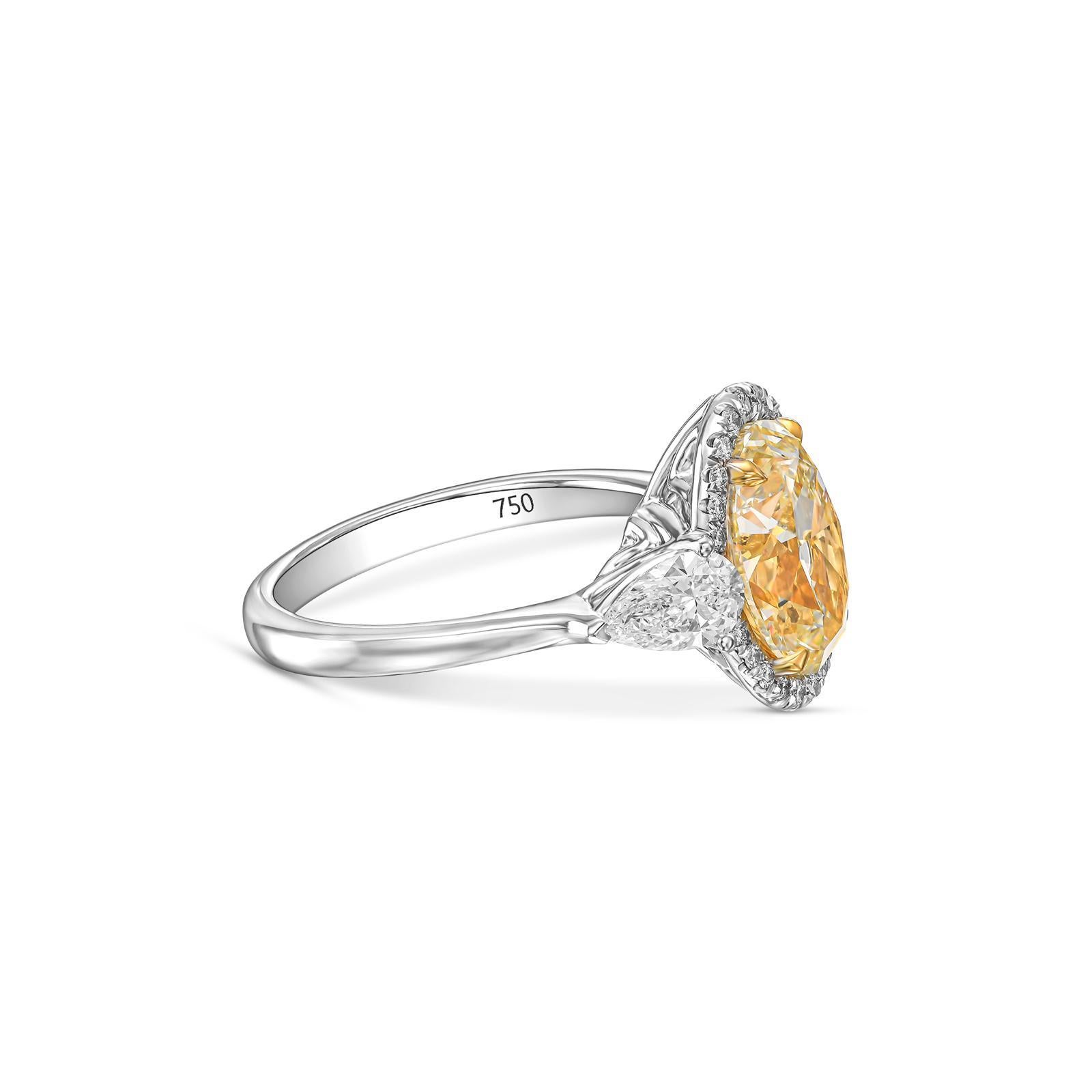 Oval Cut 3 Carat Oval Yellow Diamond, Engagement Three Stones Halo Ring, IGI Certified. For Sale