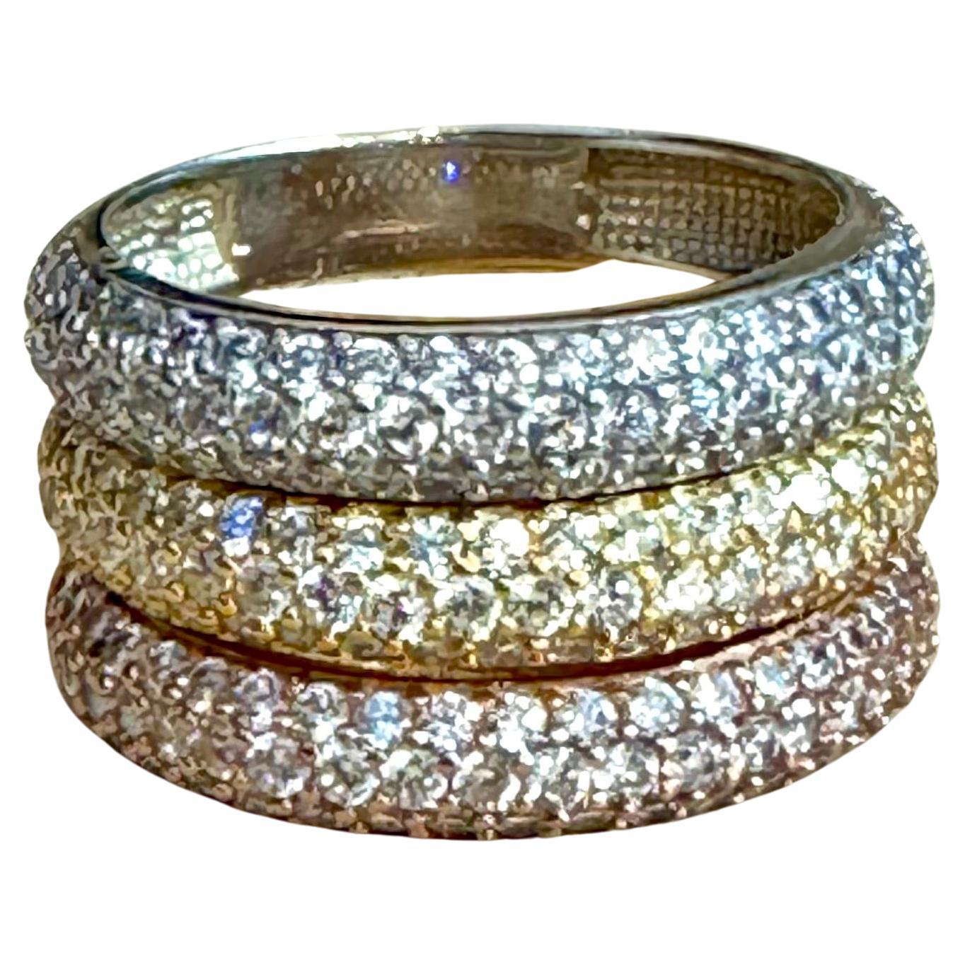 3 Carat Pave Set Diamond 3 Band in 14 Karat  White , Yellow & Pink Gold , Size 7
Wide Band Tri-Color Diamond Pave Ring
Diamond Eye clean , very fine quality 
Pave set diamonds 
There are brilliant cut Round diamonds in the ring 
Three bands stick
