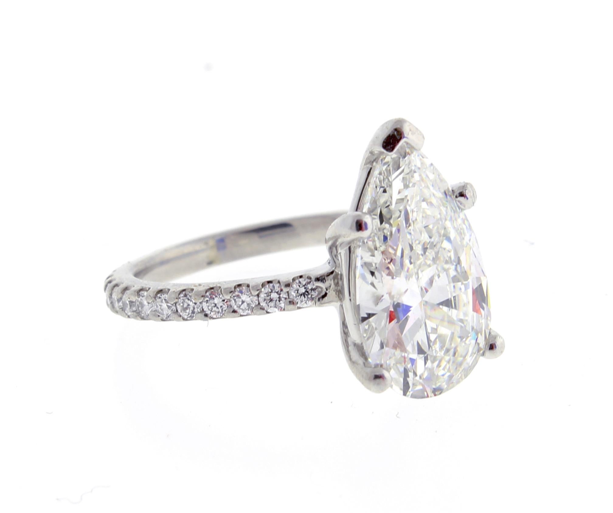 A 3.06 Carat G.I.A certified pear shape diamond ring. 
♦ Metal: Platinum
♦  Diamond  = 3.06 l carats G SI2  GIA
♦ Circa 2008
♦ Size 5, Resizable 
♦ Packaging: presentation box 
♦ Condition: Excellent , pre-owned
♦ Price: Based on the market, prices