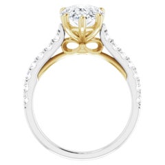 Used 3 carat pear shaped engagement ring.