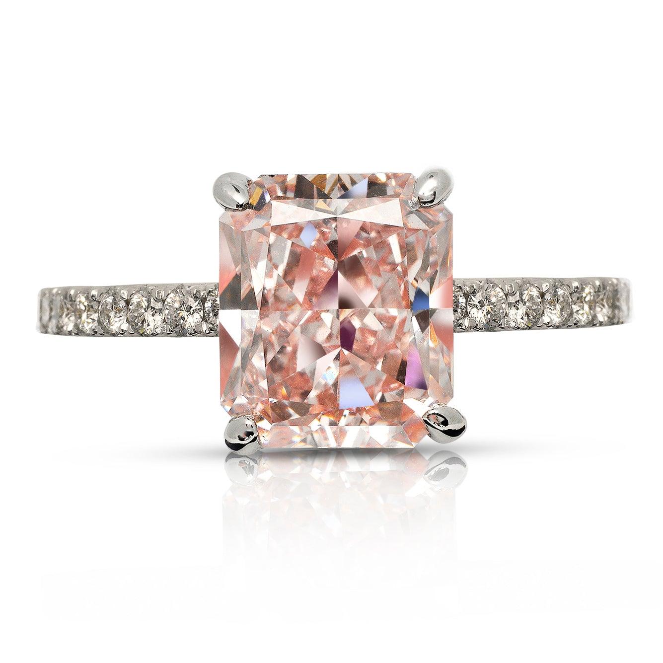 BALLET -RADIANT CUT FANCY INTENSE PINK DIAMOND ENGAGEMENT RING BY MIKE NEKTA
GIA CERTIFIED

Center Diamond:
Carat Weight: 3 Carats
Color :FANCY INTENSE PINK* FIP
Clarity: VVS2
Style: RADIANT BRILLIANT
Approximate Measurements: 8.6 x 7.3 x 5.0 mm
*