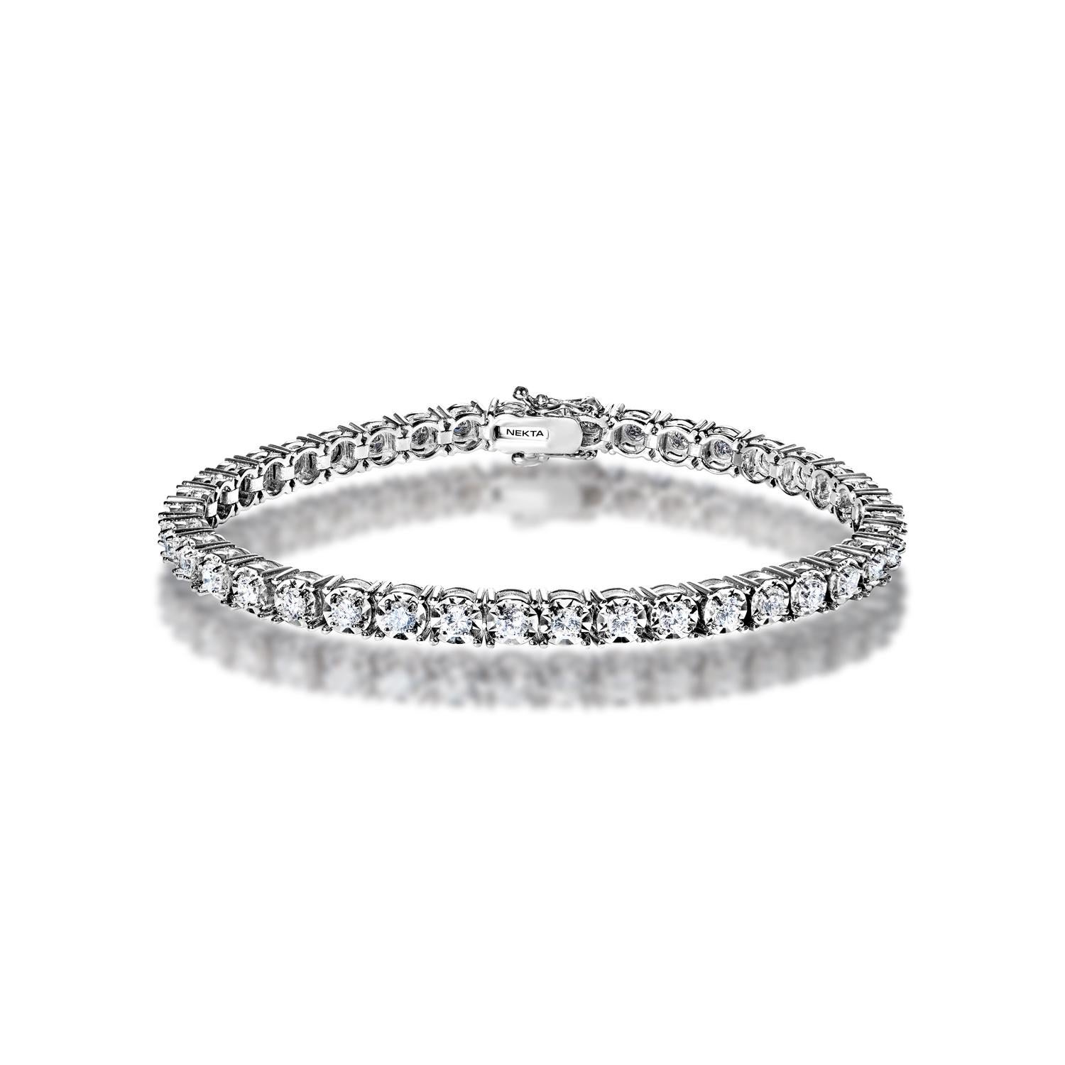 Style: Single Row Diamond Tennis Bracelet
Diamonds
Diamond Size: 2.50 Carats
Diamond Shape: Round Brilliant Cut

Setting: Miracle Set & 4 prong
Metal: 14 Karat White Gold 12.80 grams
Clasp: Box catch with hidden safety