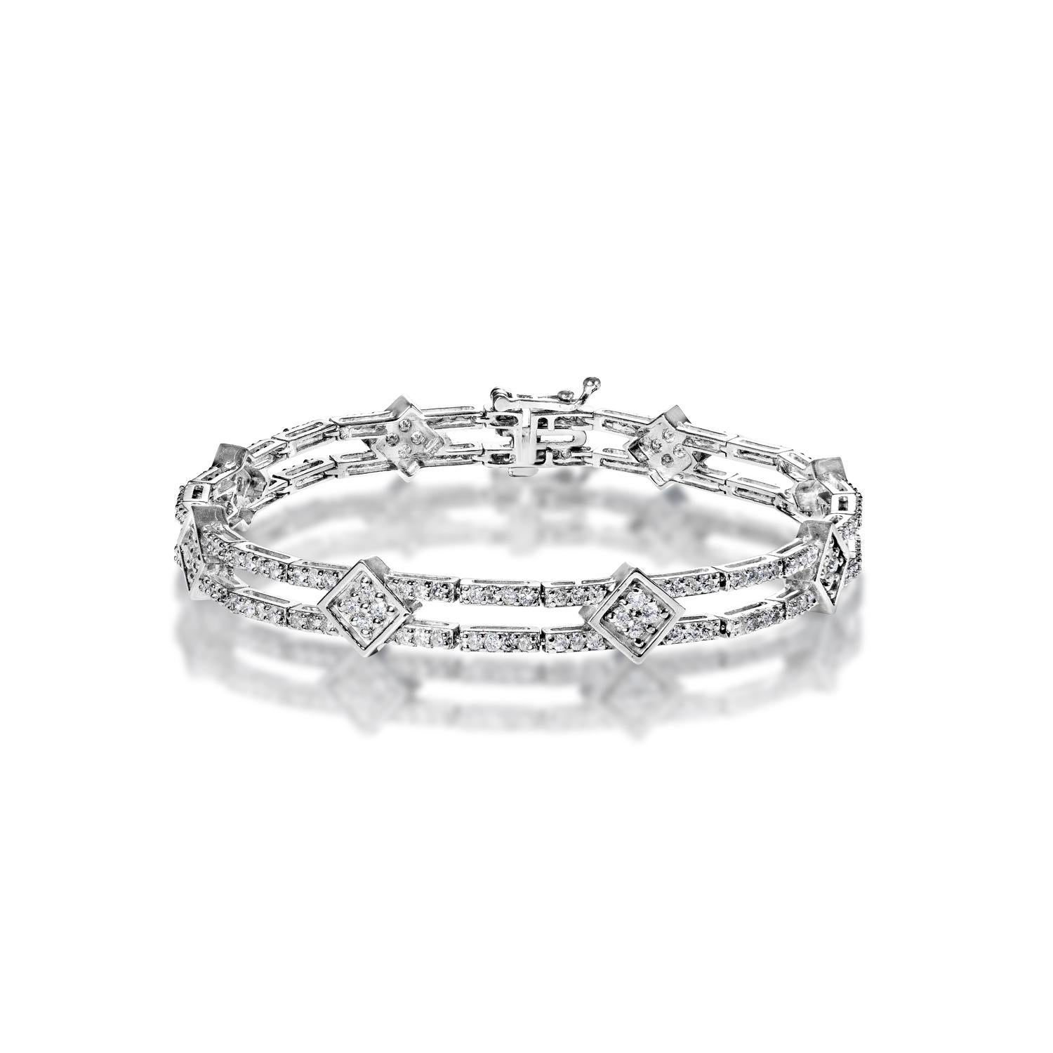 Style: Diamond Tennis Bracelet
Diamonds
Diamond Size: 3.06 Carats
Diamond Shape: Round Brilliant Cut

Setting: 
Metal: 14 Karat White Gold
Clasp: Box catch with hidden safety

Total Carat Weight: 3.06 Carats