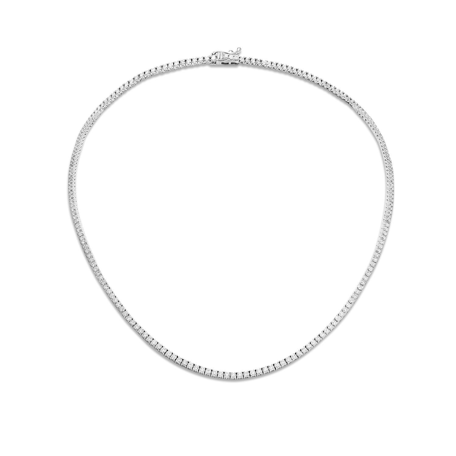 What could be more radiant than a Round Brilliant Diamond Tennis Necklace in 14 Karat White Gold For Ladies? This tennis necklace is a timeless beauty that will take her breath away. Each round diamond is hand-selected for its cut, color, and