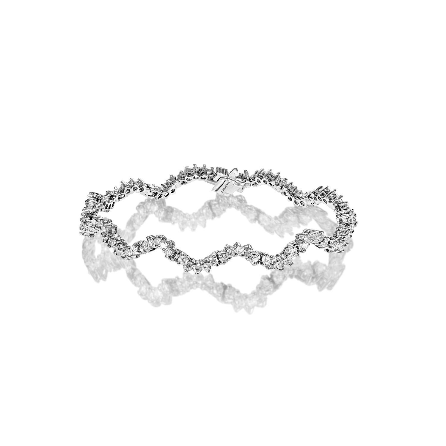 Le OAKLYN 3.34 Carat Single Row Diamond Tennis Bracelet présente des DIAMONDS RONDS BRILLIANT CUT brilliants pesant un total d'environ 3.34 carats, sertis dans de l'or blanc 14K.

Style : Bracelet de tennis à un rang de diamants


Diamants
Taille du