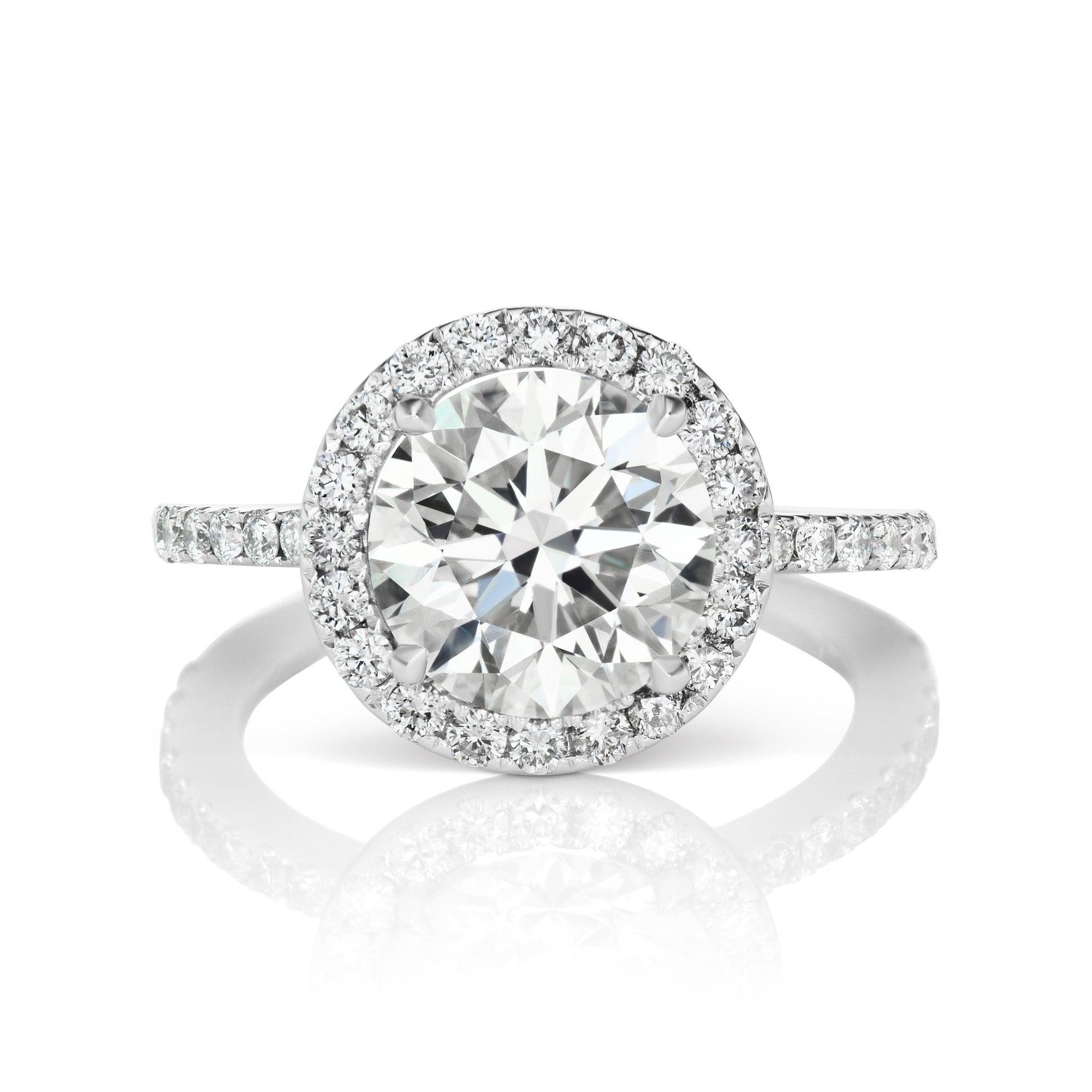  TALIA ROUND CUT DIAMOND ENGAGEMENT RING in 18K WHITE GOLD BY MIKE NEKTA

Center Diamond:
Carat Weight: 2.24 Carats
Color : I
Clarity: VS1*
Style: ROUND BRILLIANT
Measurements: 8.29 x 8.32 x 5.23 mm
* Clarity Enhanced

Ring:
Metal: 18K WHITE GOLD 