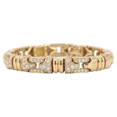 Armband mit Pavé-Verzierung aus 18-karätigem Gelbgold und einem runden Diamanten von 3 Karat