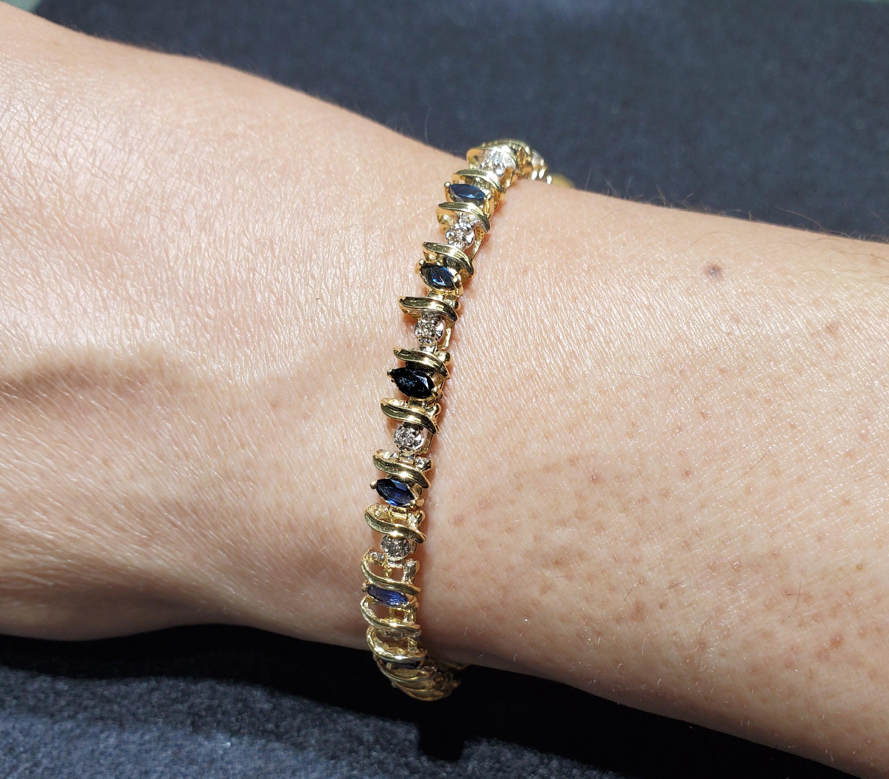 ♥ Descripción de la pulsera de tenis ♥

Piedra principal: Diamante y Zafiro
Aprox. Peso total en quilates: 3,00 ctw
Tipo de metal: Oro amarillo de 14 quilates
Corte de la Piedra: Marquesa y Redonda
Metal Peso: 12 gramos
Longitud de la pulsera: 7