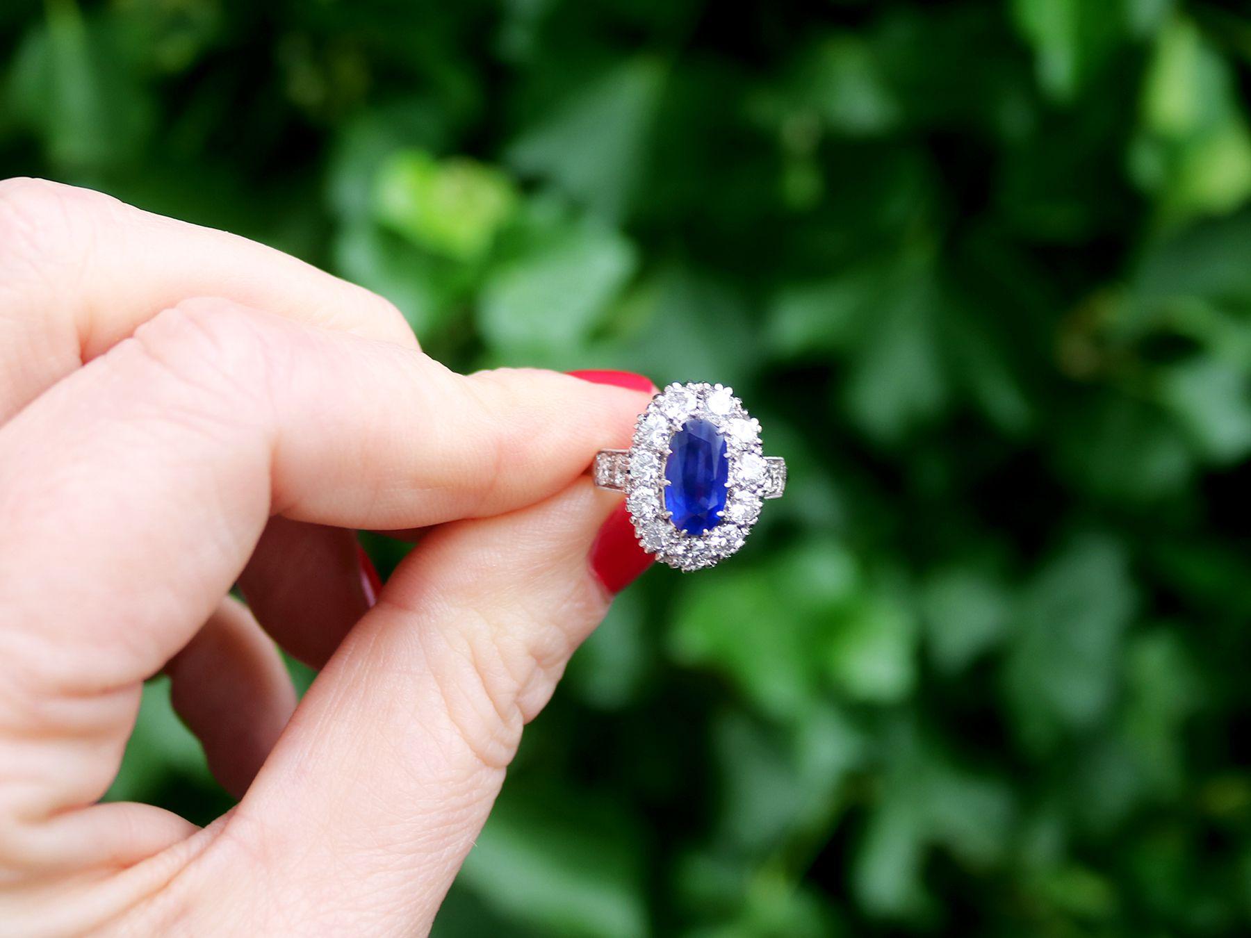 A stunning antique 3 carat Burmese sapphire and 1.83 carat diamond, 18 karat white gold and platinum set dress ring; part of our diverse antique jewelry and estate jewelry collections.

This stunning, fine and impressive sapphire ring has been