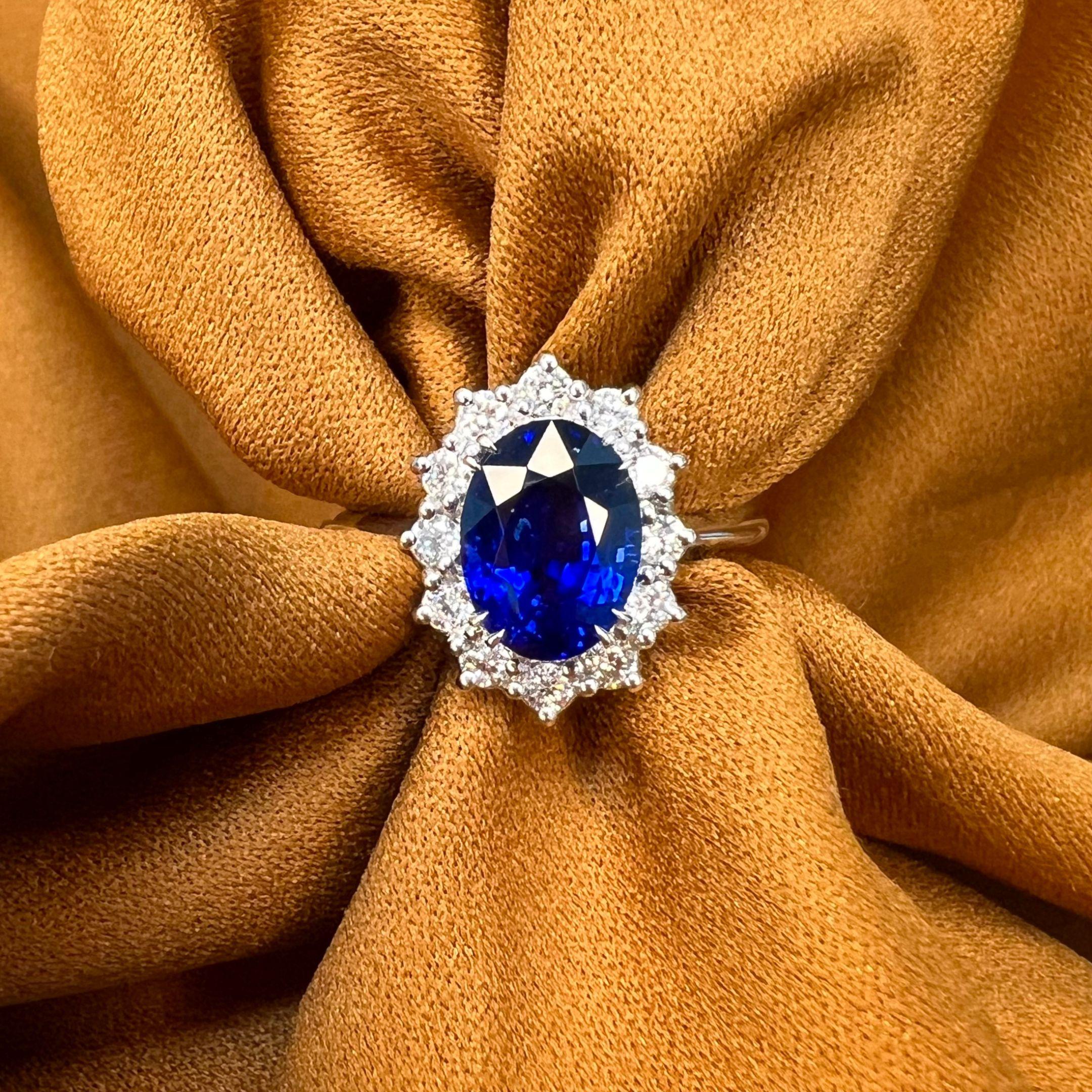 Sapphire Weight: 3.02 CTs
Measurements: 9x6 mm
Diamond Weight: 0.36 CTs (2mm)
Metal: 18K White Gold 
Gold Weight: 4.55 gm
Ring Size: 7
Shape: Oval
Color: Royal Blue
Hardness: 9
Birthstone: September
Product ID: MUR23937/Line 7