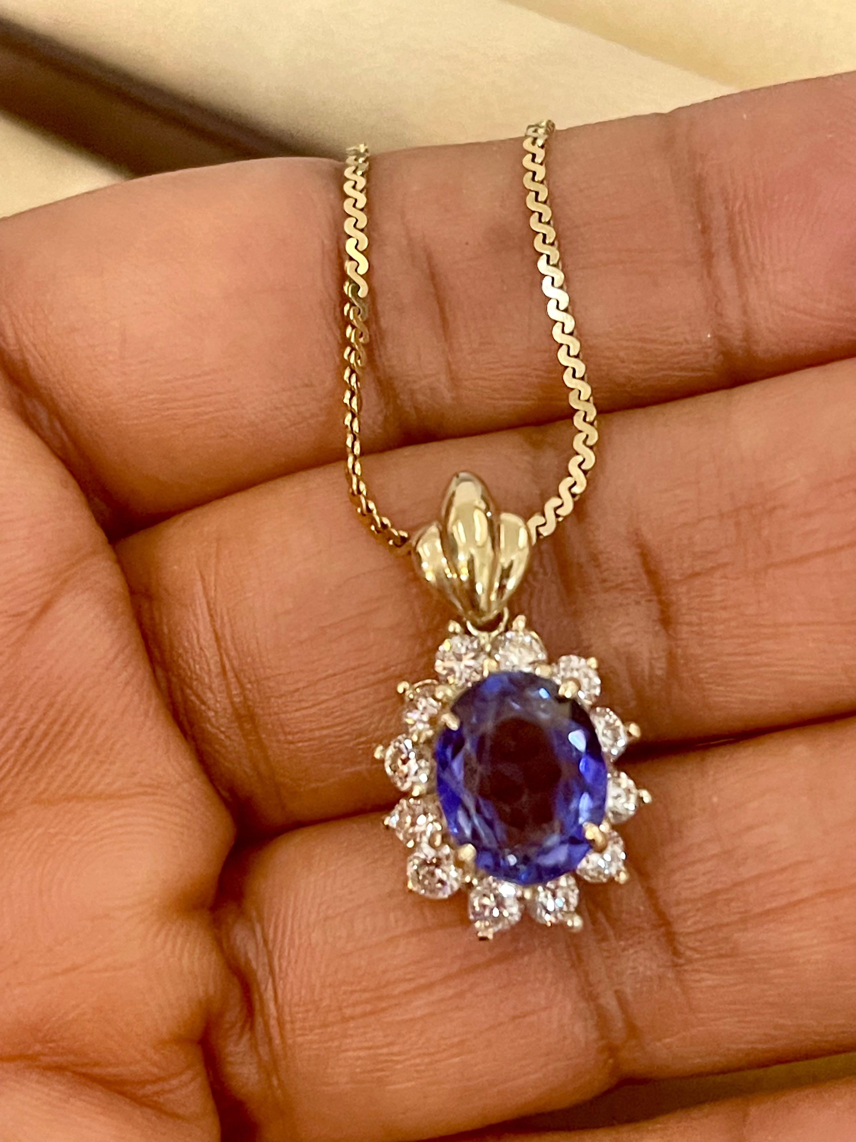 3 Carat Tanzanite and 1 Ct Diamond Pendant or Necklace 14 Karat Yellow Gold In Excellent Condition For Sale In New York, NY