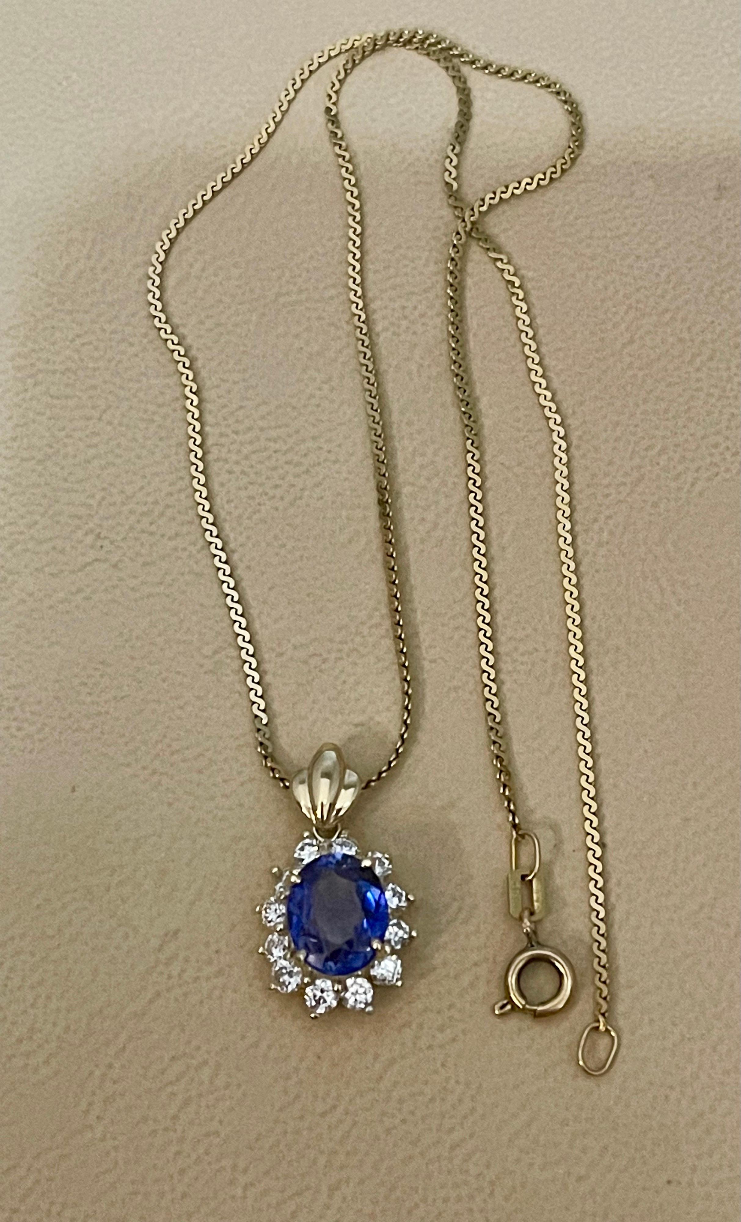 3 Carat Tanzanite and 1 Ct Diamond Pendant or Necklace 14 Karat Yellow Gold For Sale 1