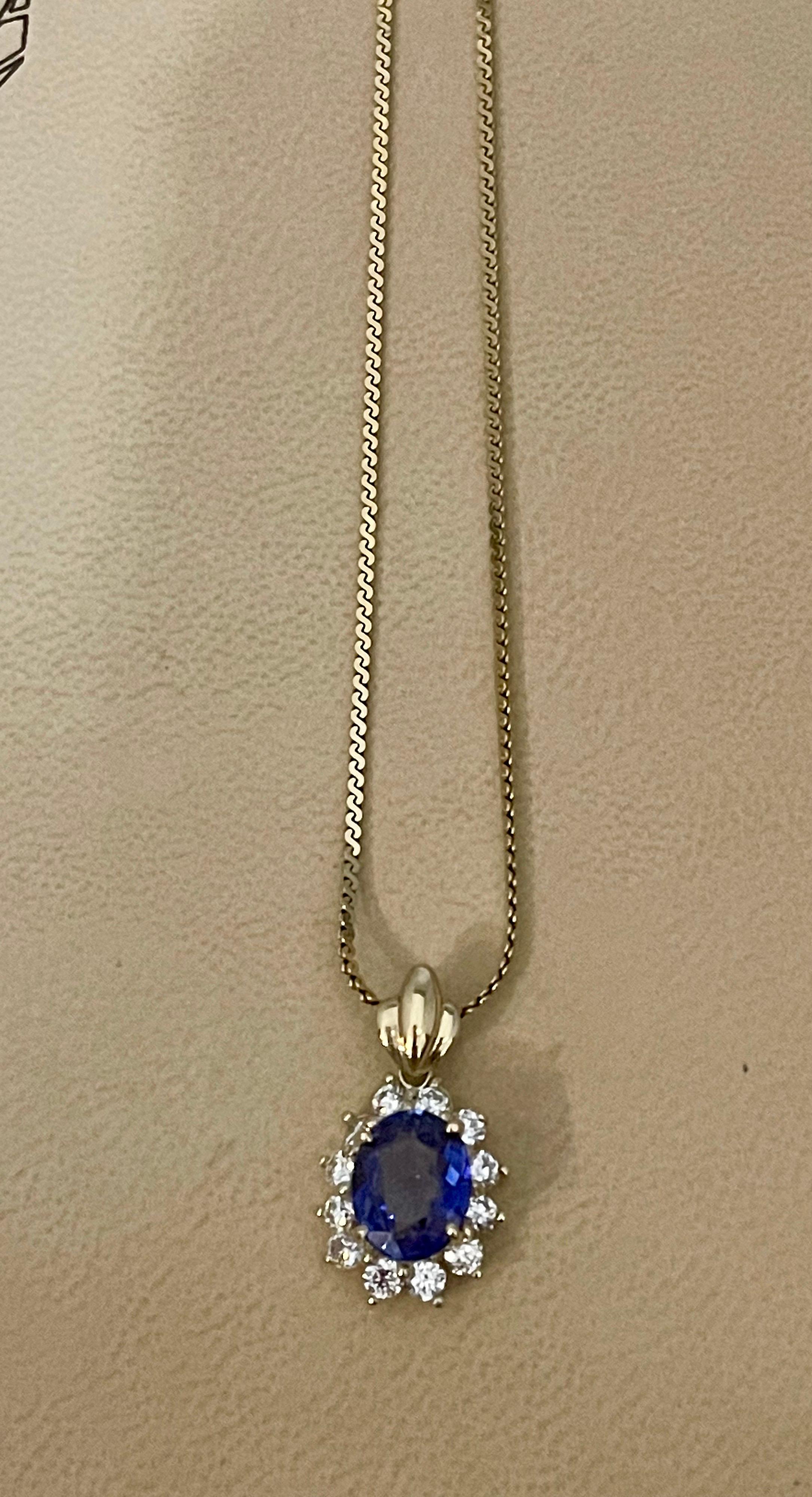 3 Carat Tanzanite and 1 Ct Diamond Pendant or Necklace 14 Karat Yellow Gold For Sale 2