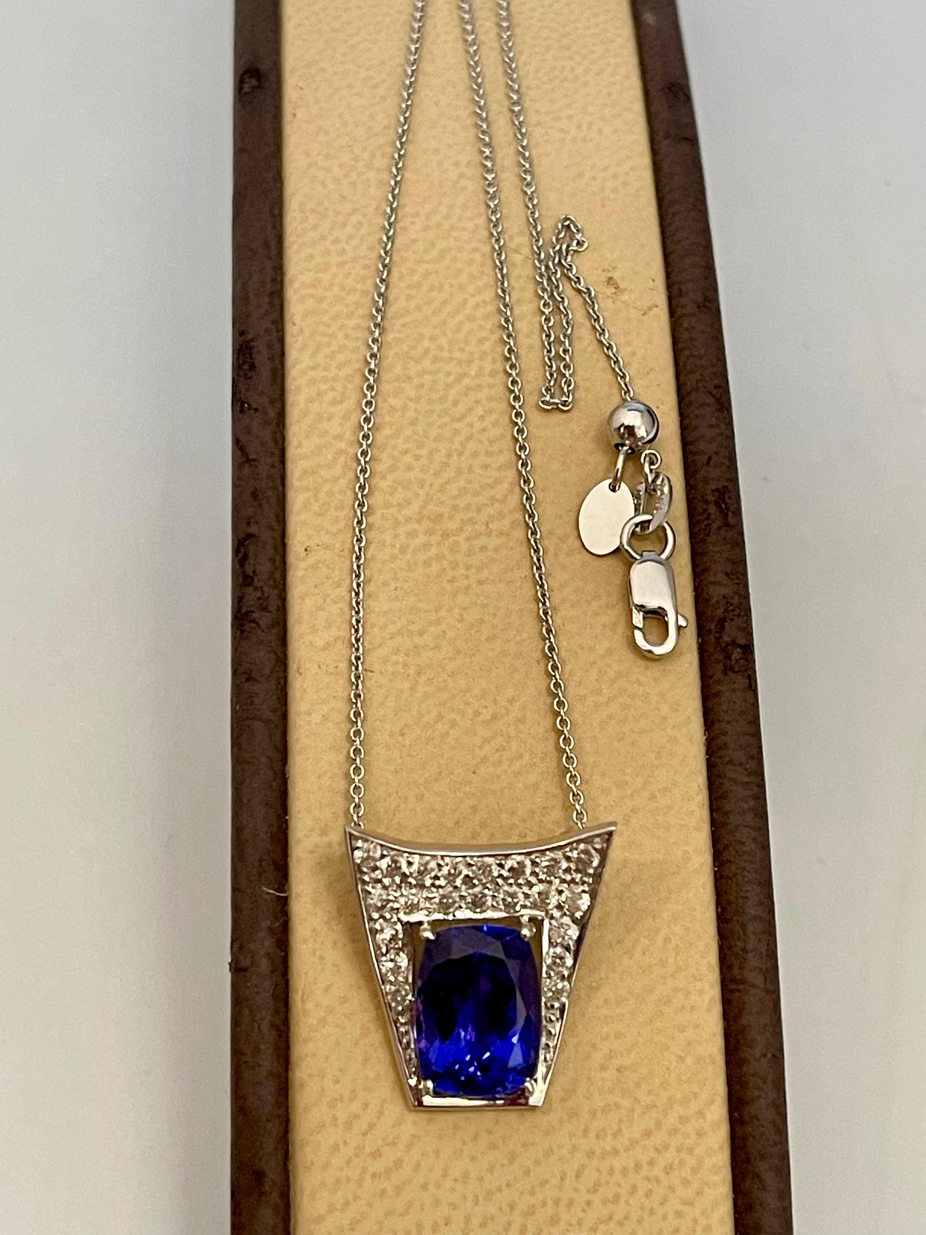 Women's 3 Carat Tanzanite and 2 Carat Diamond Heart Pendant/ Necklace 18 Karat Gold For Sale