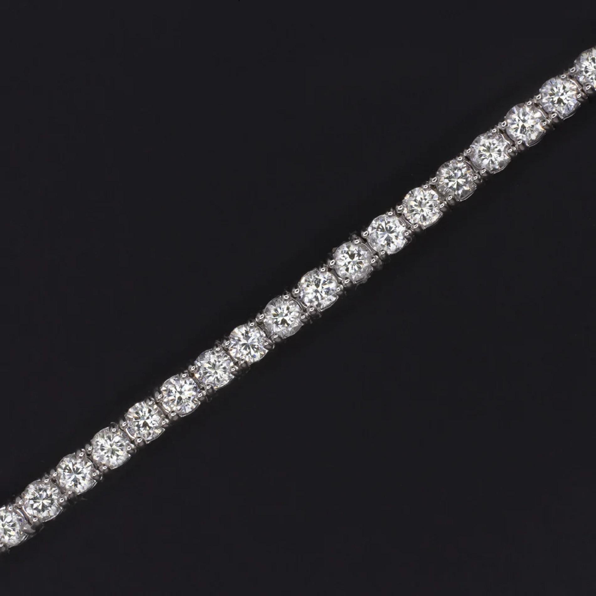 brilliantly sparkling tennis bracelet has a classic design that will never go out of style! Featuring 5 carats of bright white, eye clean diamonds, this beauty offers brilliant, eye catching sparkle. This bracelet is sure to delight and would make