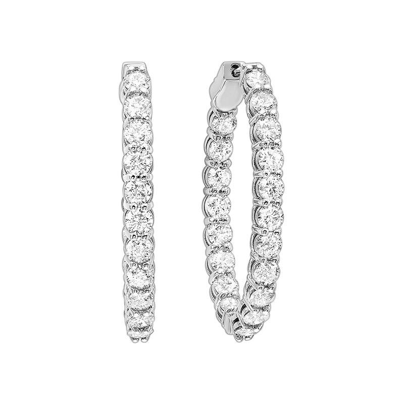 Nothing says luxury like an incredible pair of diamond hoop earrings. These stunning brightly polished 14 karat white  gold inside out round-shaped hoop earrings feature a total of 50 round brilliant cut diamonds totaling 3.00 carats are prong set