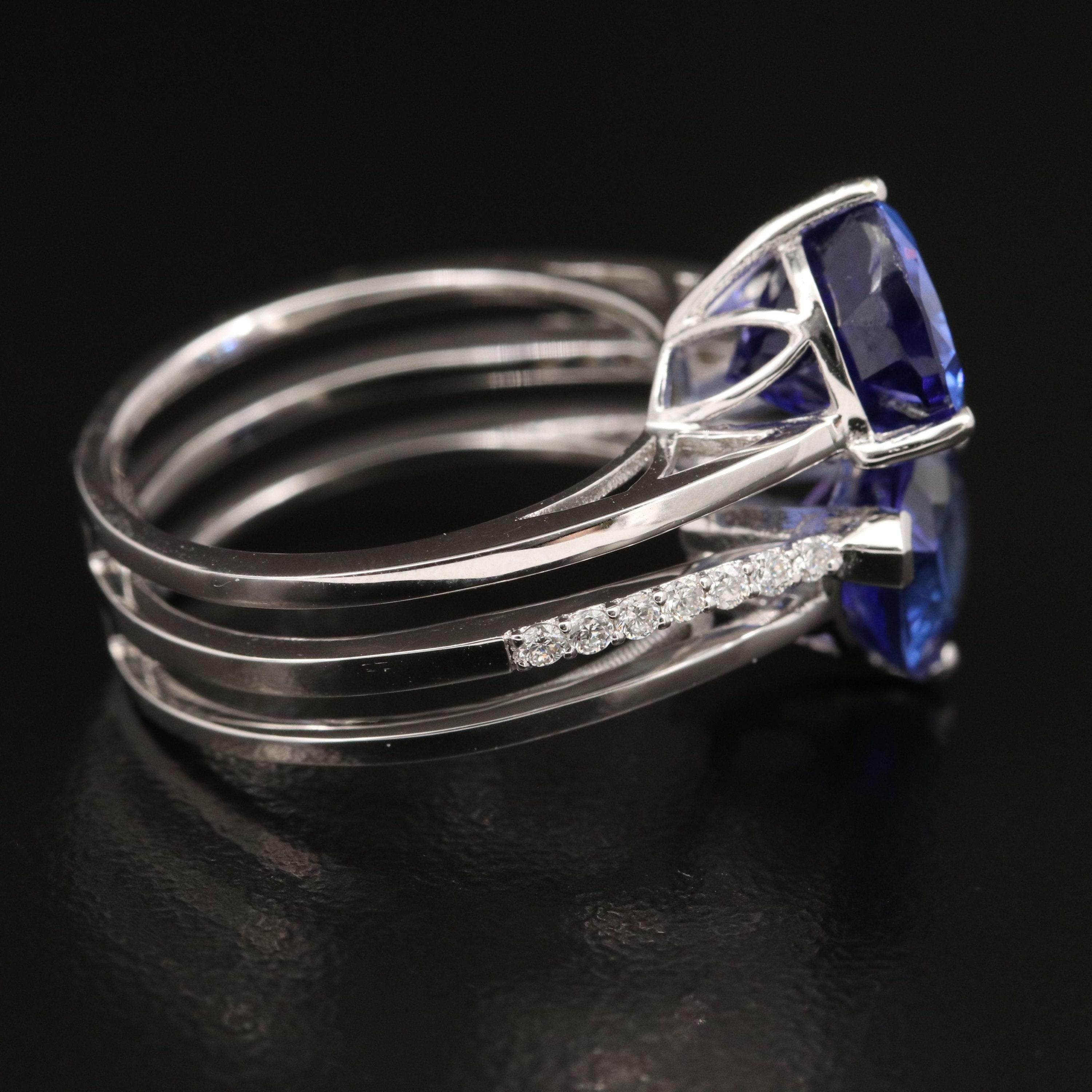 Im Angebot: 3 Karat Trillionschliff Tansanit Verlobungsring aus Weißgold mit 3 Karat () 6