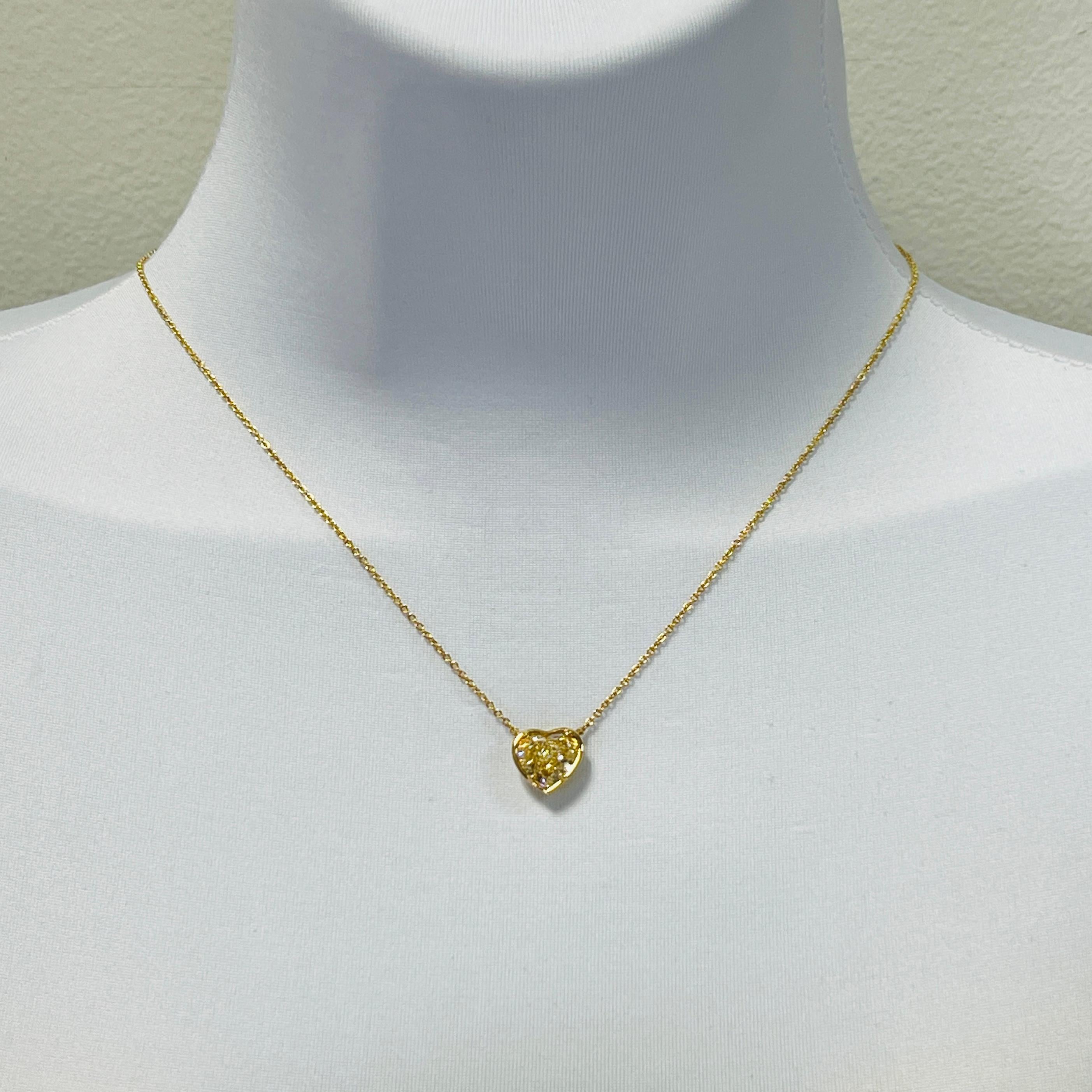 Gorgeous 3.00 ct. natural yellow diamond heart shape.  Handmade in 18k yellow gold.  Length is 18