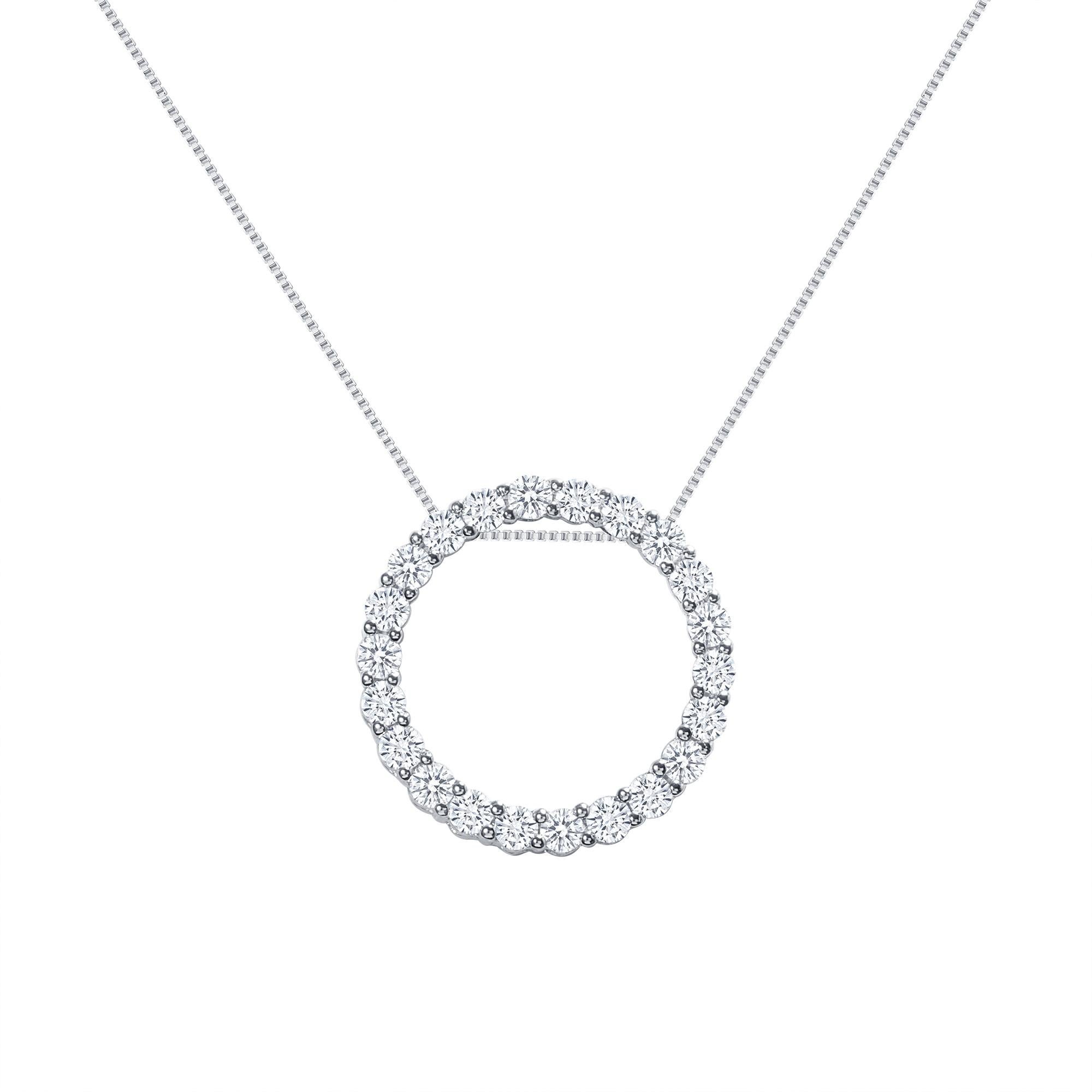 This diamond circle pendant provides a glowing chic look.
Metal: 14k Gold
Diamond Total Carats: 3 carat
Diamond Cut: Round Natural Diamonds (Not Lab Grown)
Diamond Clarity: VS
Diamond Color: F-G
Color: White Gold
Necklace Length: 16 inches