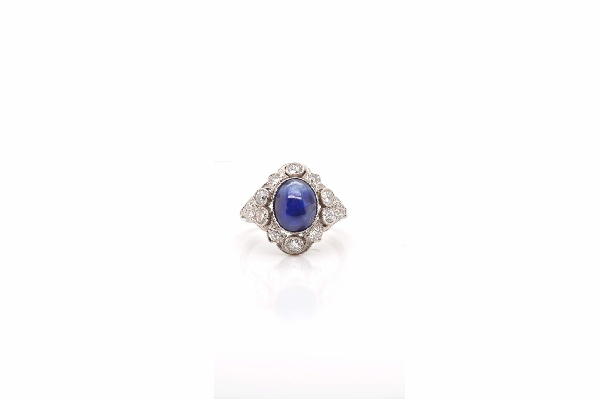 Stones: 3 carats cabochon sapphire and old-cut diamonds
for a total weight of 0.60 carat.
Material: Platinum
Dimensions: 16mm length on finger
Period: 1930
Weight: 5.3g
Size: 52 (free sizing)
Certificate
Ref. : 24373

