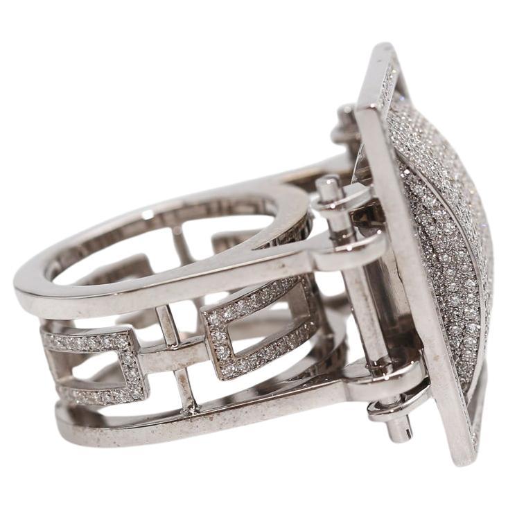 A true one-of-a-kind ring. With approximately 3 Carats of fine Diamonds finished in an 18K White Gold. Perfectly Geometrical design. Created in 200.

It is a bold statement of a ring. It will grab attention on any occasion. Could be worn daily yet