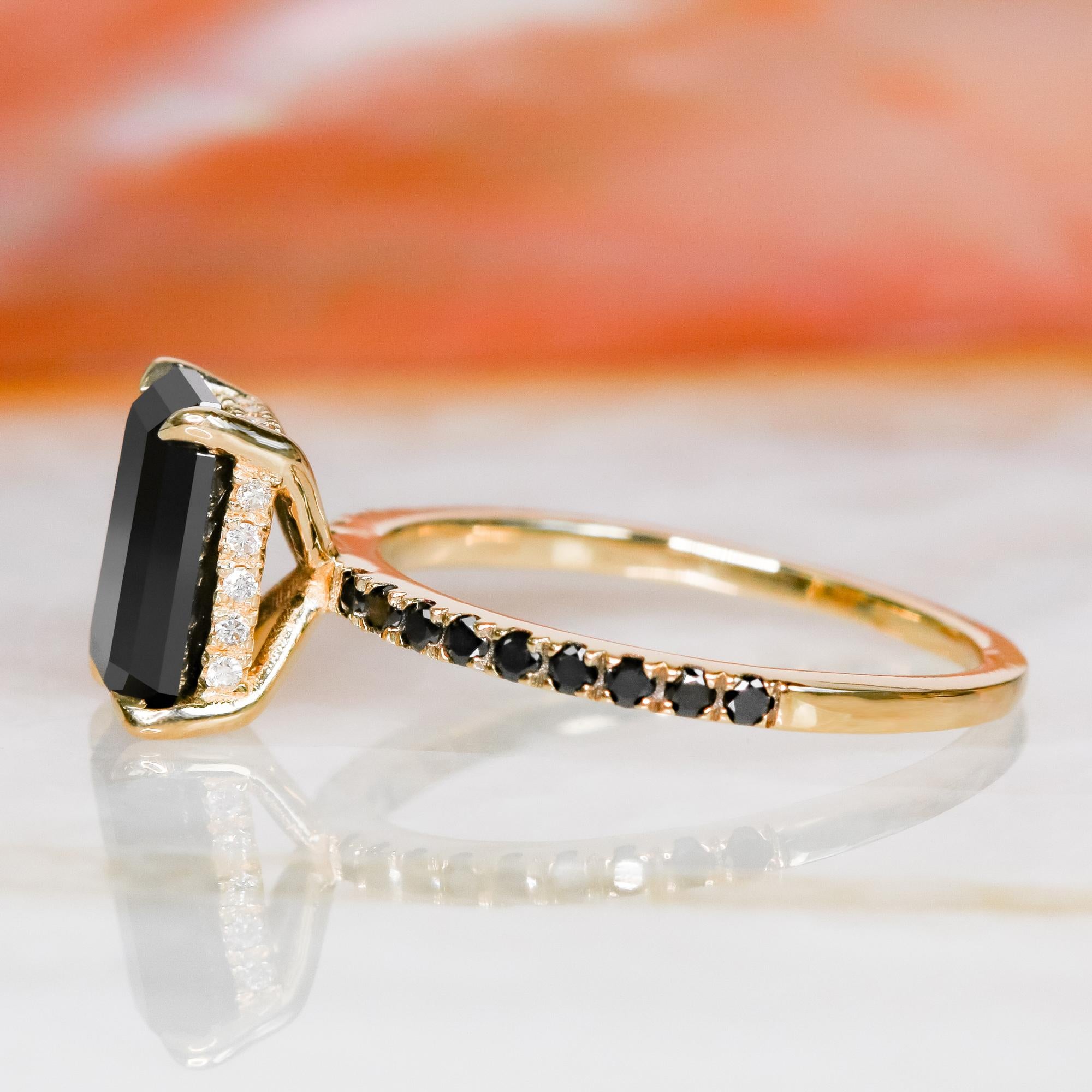 black diamond emerald cut engagement ring