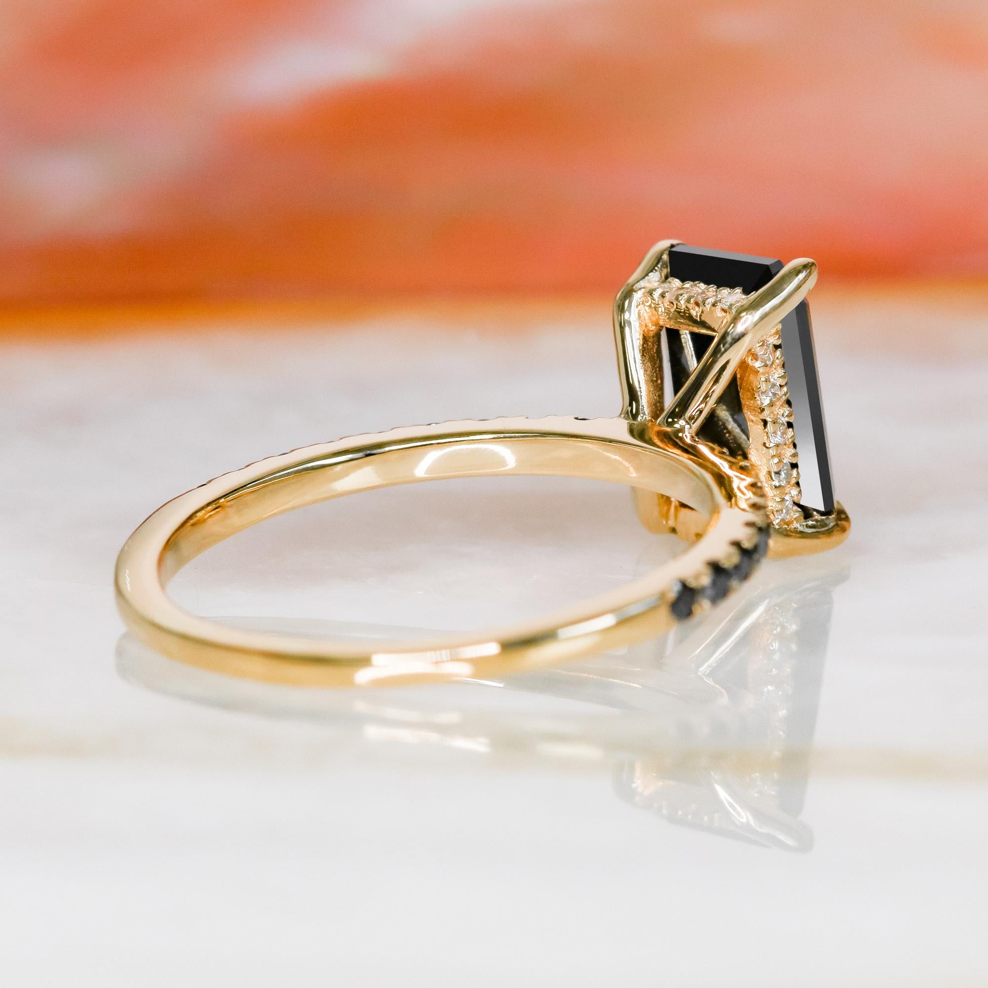 emerald cut black diamond ring