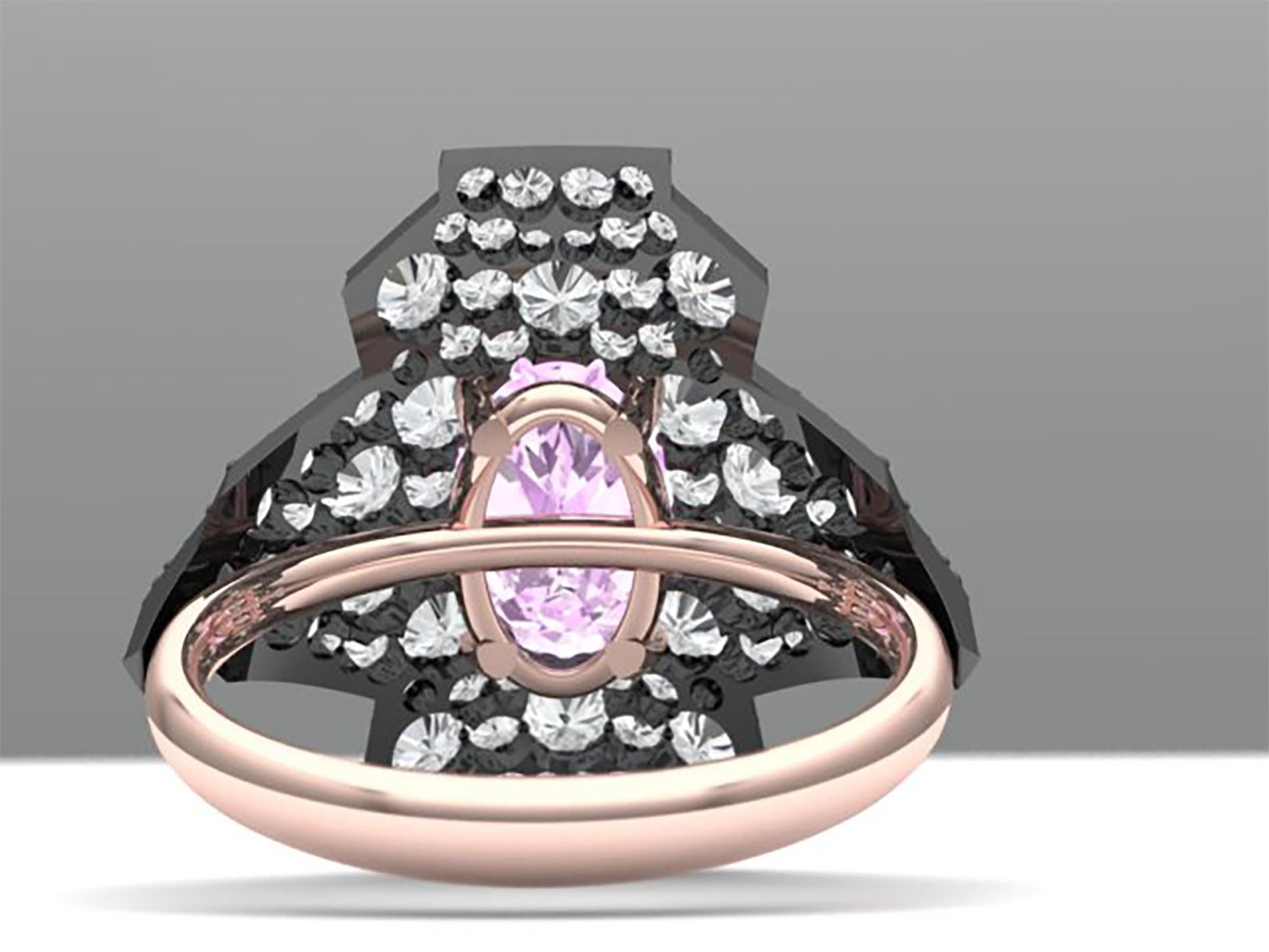 This shield ring style ring has a gorgeous surface laid with grey white round brilliant diamonds.  The center stone is a pink oval Tourmaline that is oval cut and weighs 1.5 carats appx.  The center stone is accented by 1.5 carats of diamonds set in