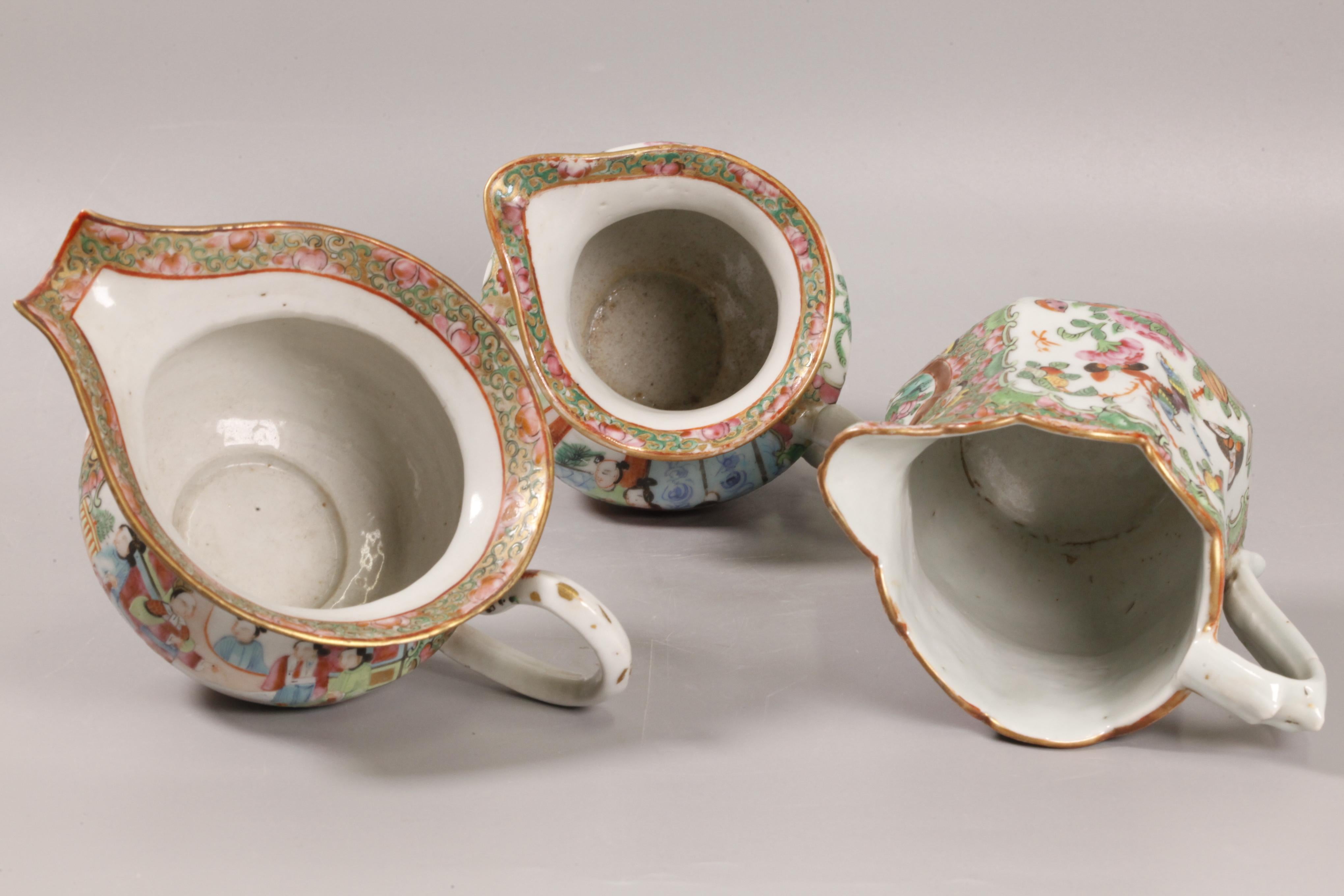 decorated with figural scenes; 4.5in(D) x 6.7in(W) x 5.4in(H) are the dimensions of the tallest jug