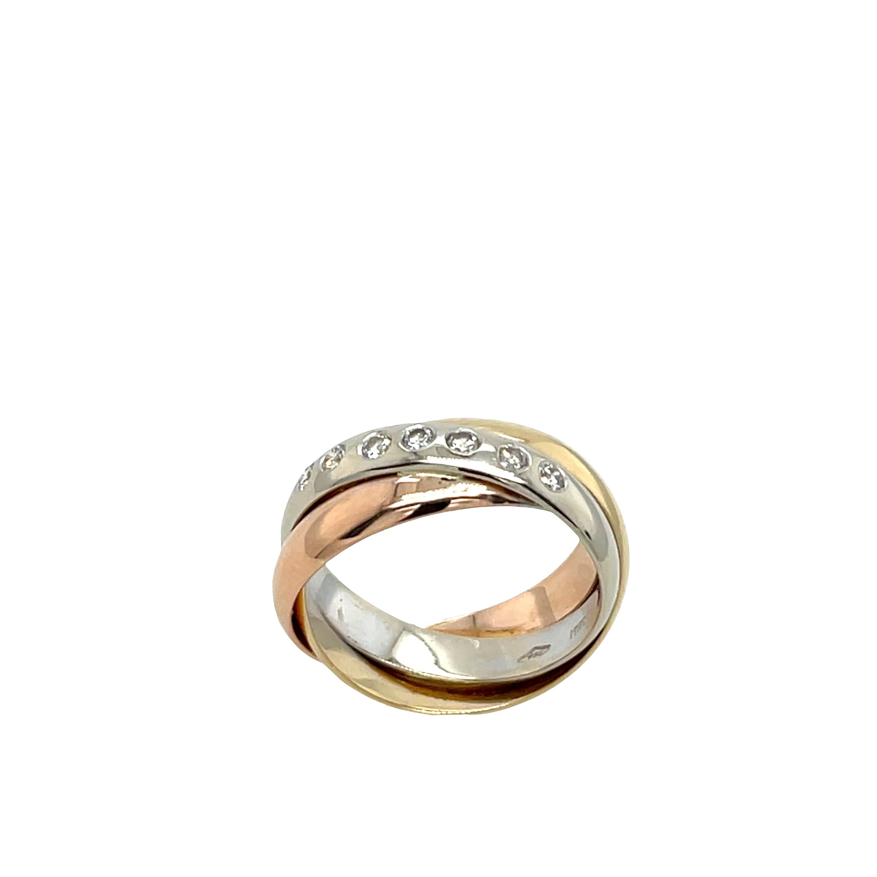 A timeless symbol of unity and elegance, this 3 Colour wedding ring features interwoven bands of 18ct yellow, white, and rose gold, representing harmony and everlasting love. Set with 7 sparkling natural diamonds, this ring beautifully combines