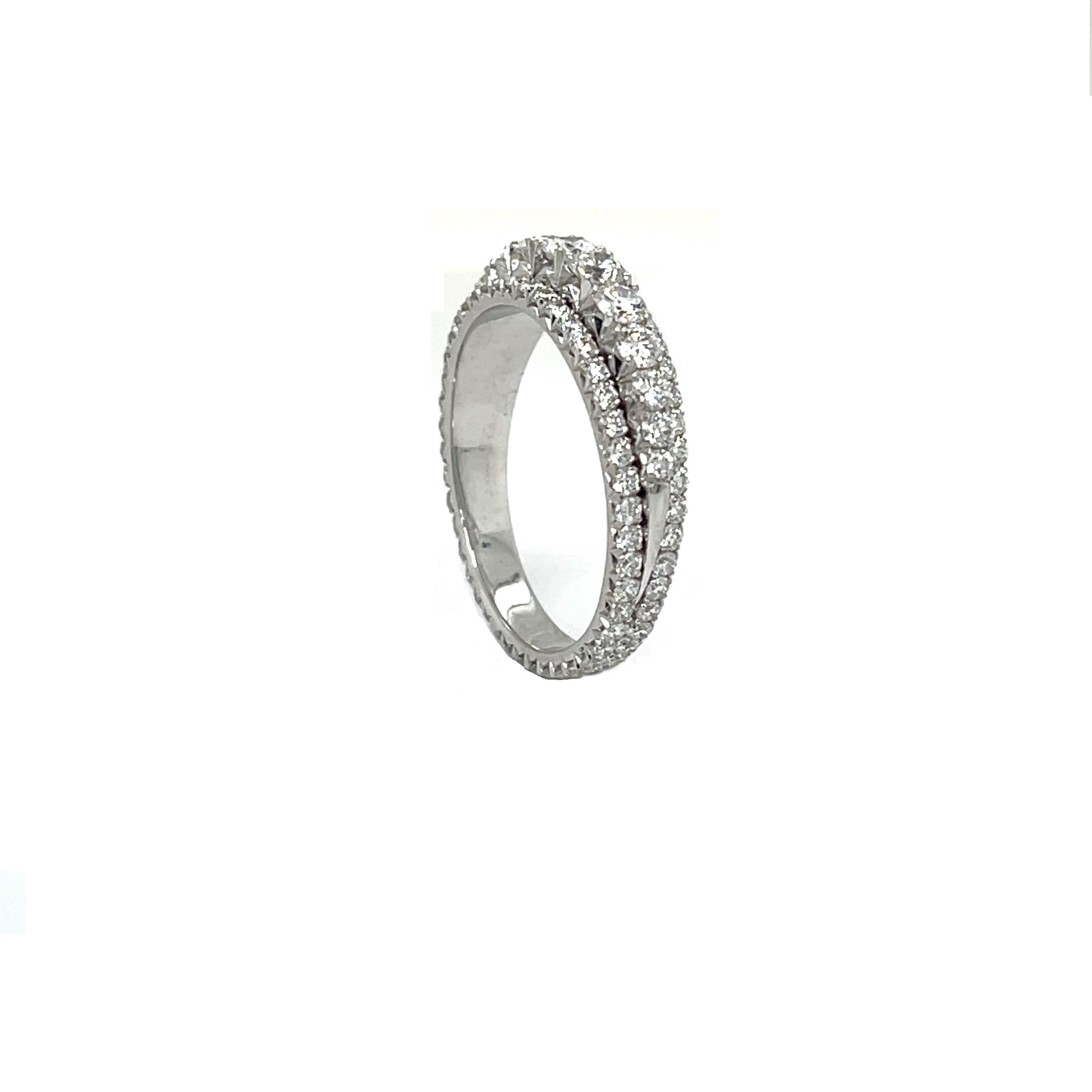 18K White 3 Piece Rings Set in Micro Pave Fish Tail 

Metal: 18K White Gold
Diamond Info: G VS, 101 Round Brilliant Diamonds 
Total Diamond Weight: 1.35 cwt.
Item Weight: 3.60 gm
Ring Size:  5.75 (Not re-sizable)
Measurement: 5.3 mm width

