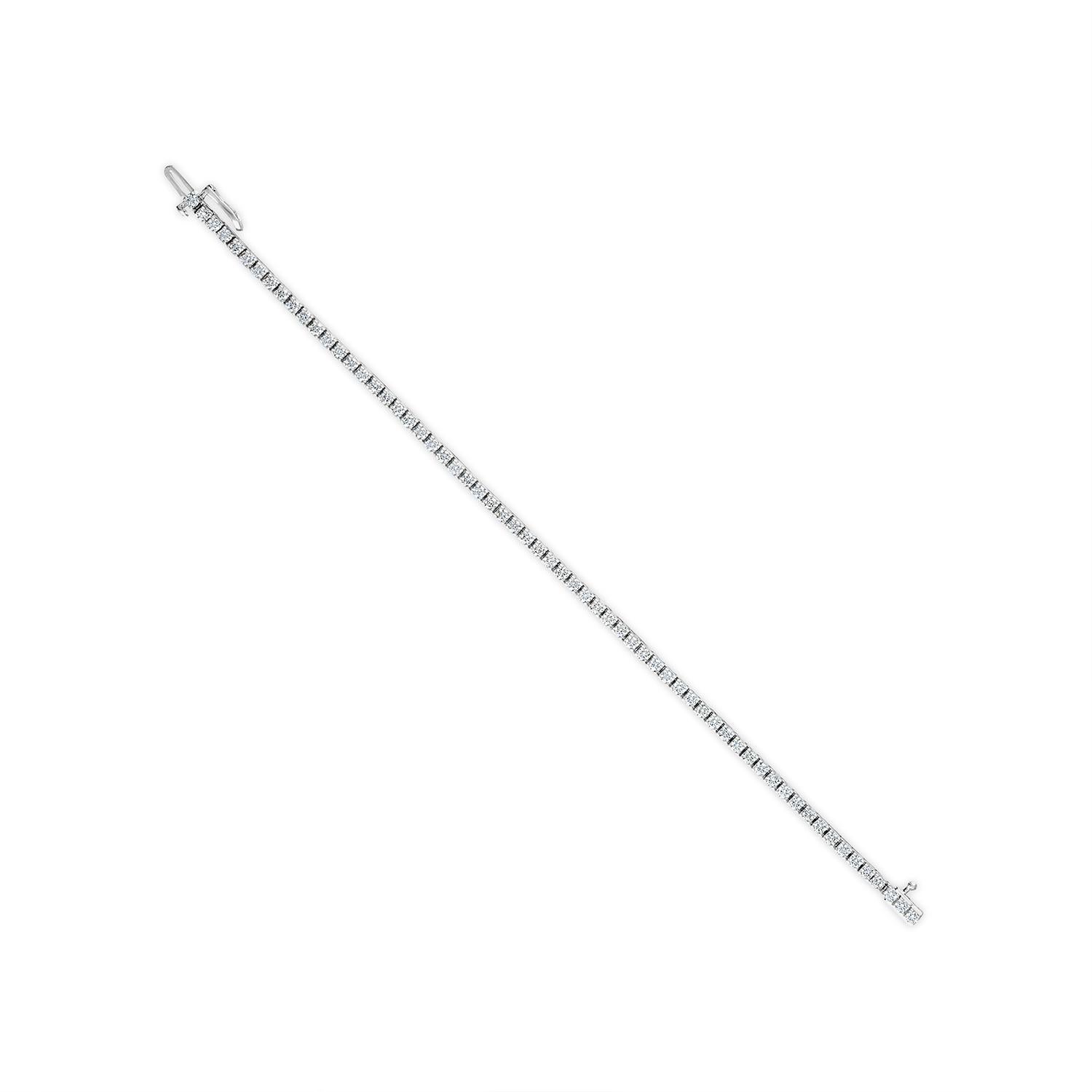 Metal: 14kt White Gold  
Diamond Shape: Round Brilliant
Total Diamond Weight: 3.00 CTW
Number of Diamonds: 63
Length: 7.5 inches
Clarity: Very Slightly Included ( VS2 )
Color: Near Colorless ( I )
Clasp:  Hidden Clasp with Safety Catch
