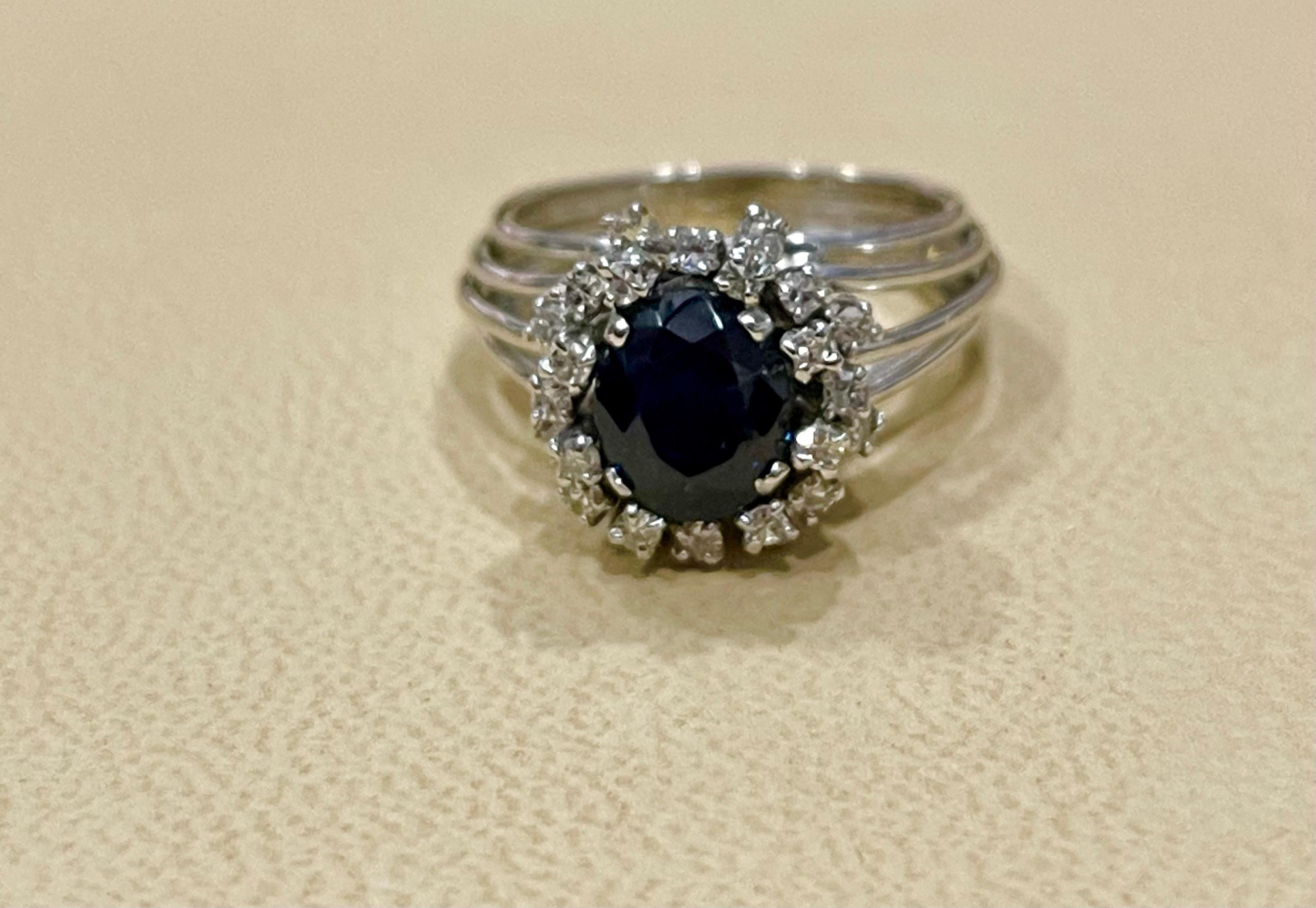 Round Cut 3 Ct Mid Night Blue Sapphire and 0.25 Ct Diamond Cocktail Ring, Platinum, Estate