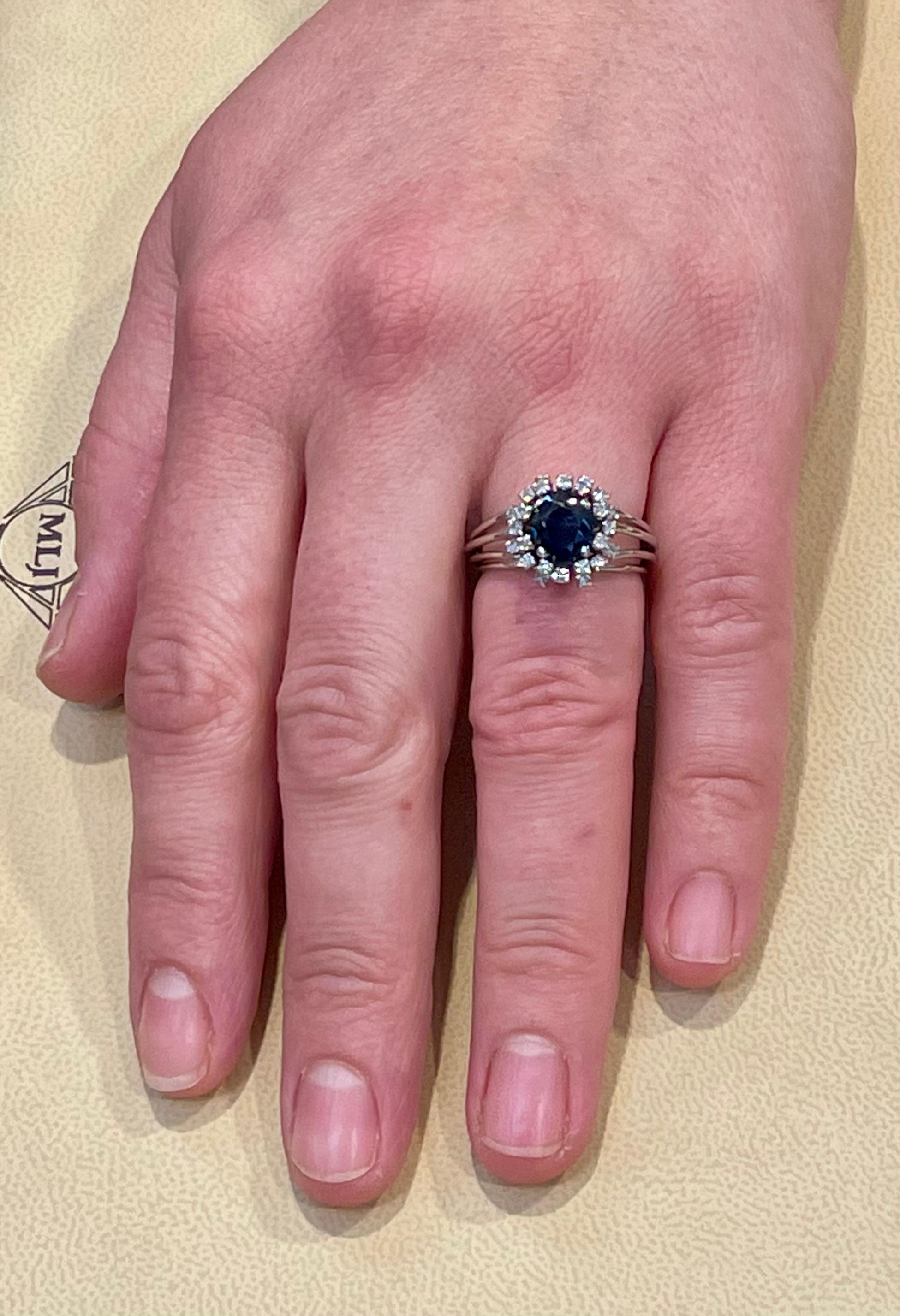 3 Ct Mid Night Blue Sapphire and 0.25 Ct Diamond Cocktail Ring, Platinum, Estate In New Condition In New York, NY