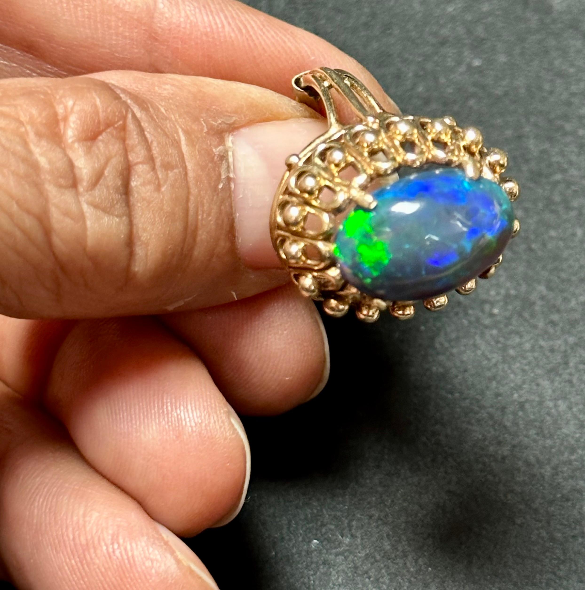 3 Ct Oval Shape Black Australian Opal Cocktail Ring 14 Kt Yellow Gold , Unisex In Excellent Condition In New York, NY