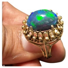 3 Ct Oval Shape Black Australian Opal Cocktail Ring 14 Kt Yellow Gold , Unisex